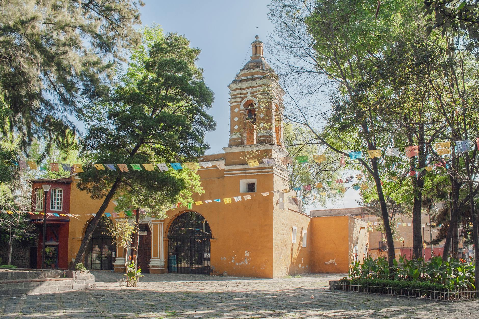 Chapel of Santa Catarina surrounded by greenery in Mexico City