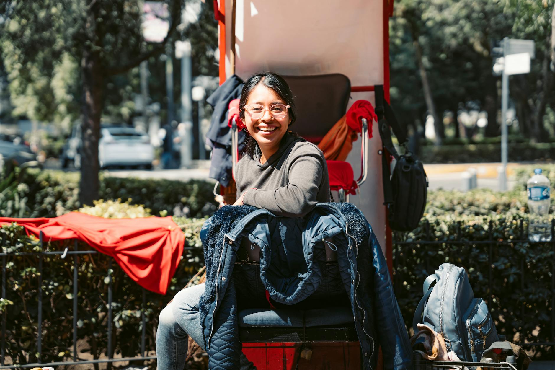 Woman smiling in a sunny Mexico City park