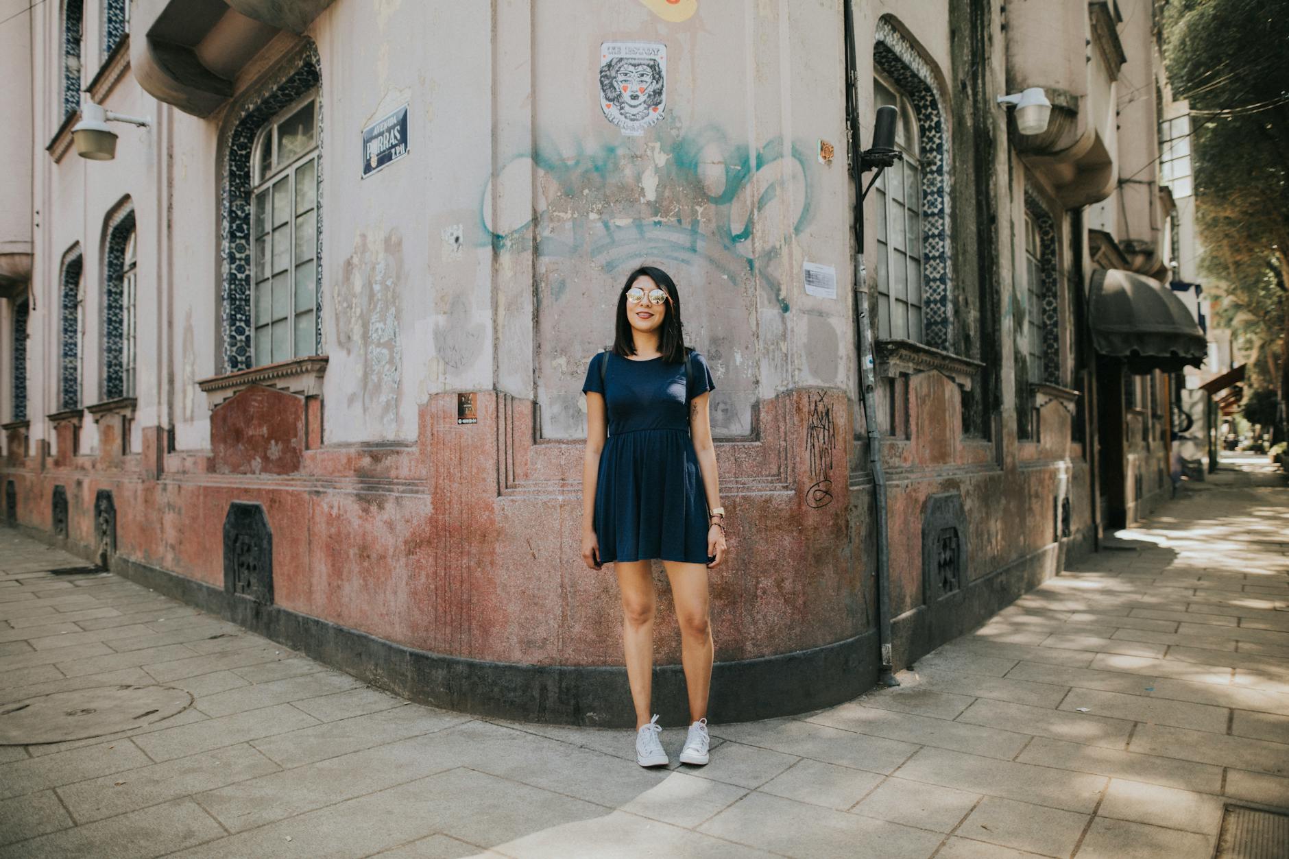 Woman standing near a historic building in Mexico City