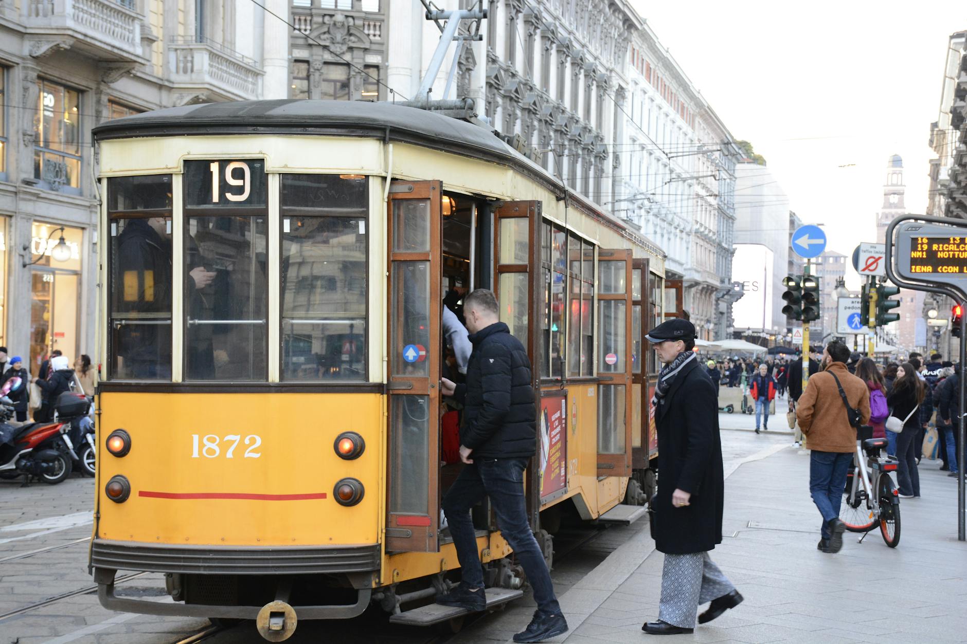 Yellow tram on a Milan street