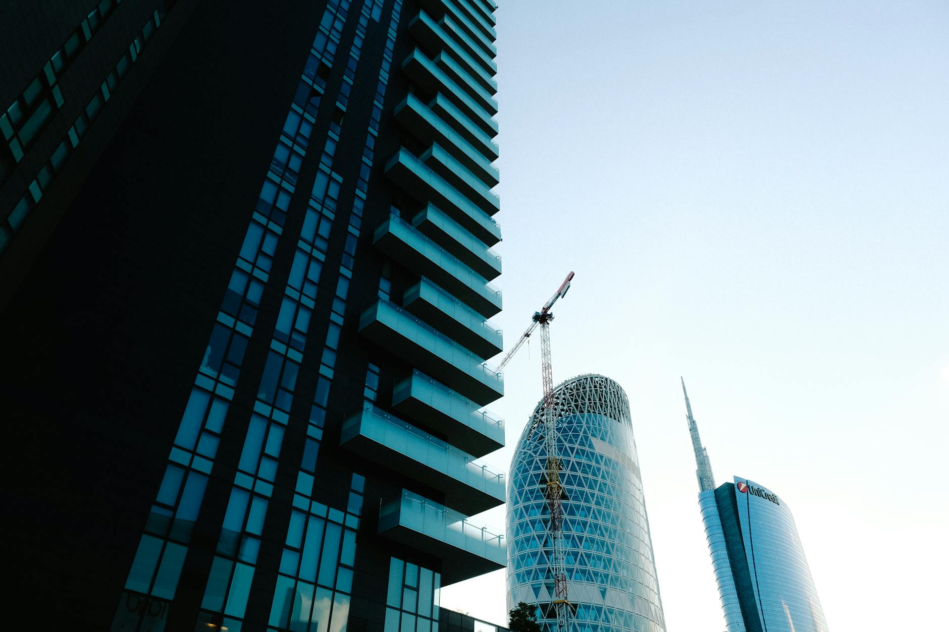 Milan modern skyline with blue glass towers