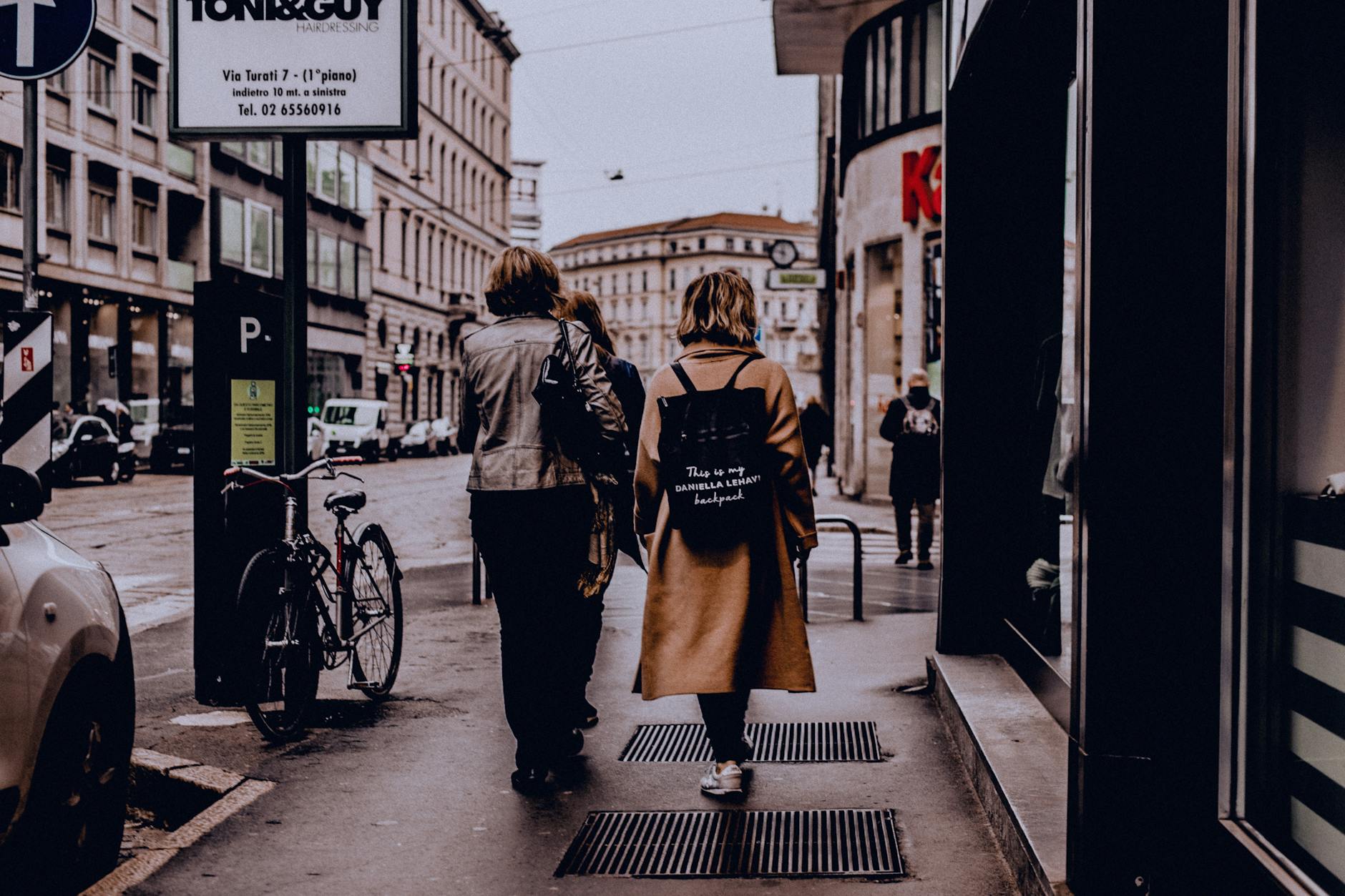 Women walking on a Milan sidewalk