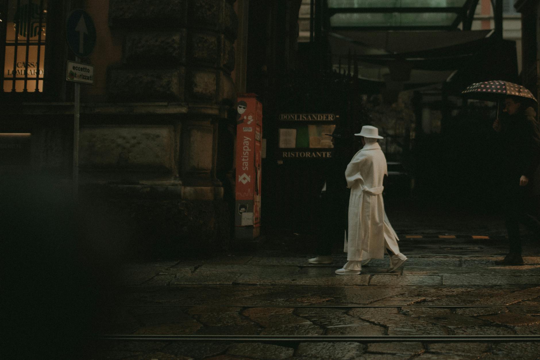 Woman in a white outfit on a Milan street