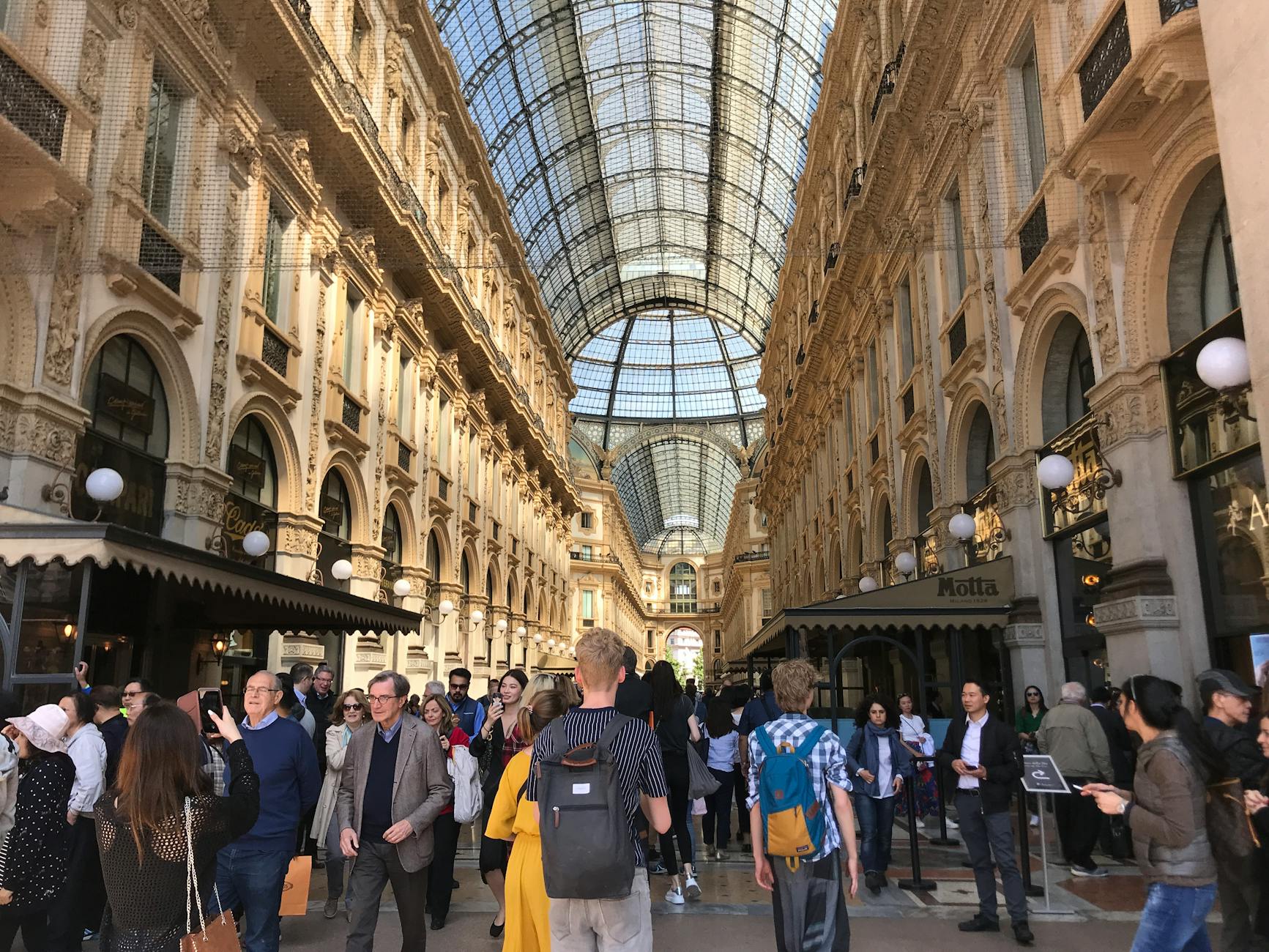 People walking through Galleria Vittorio Emanuele II