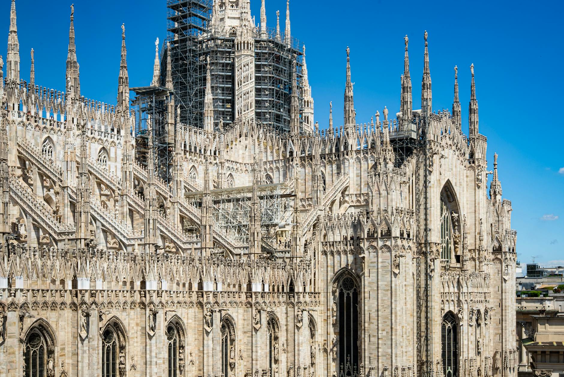 Milan Cathedral under a clear blue sky