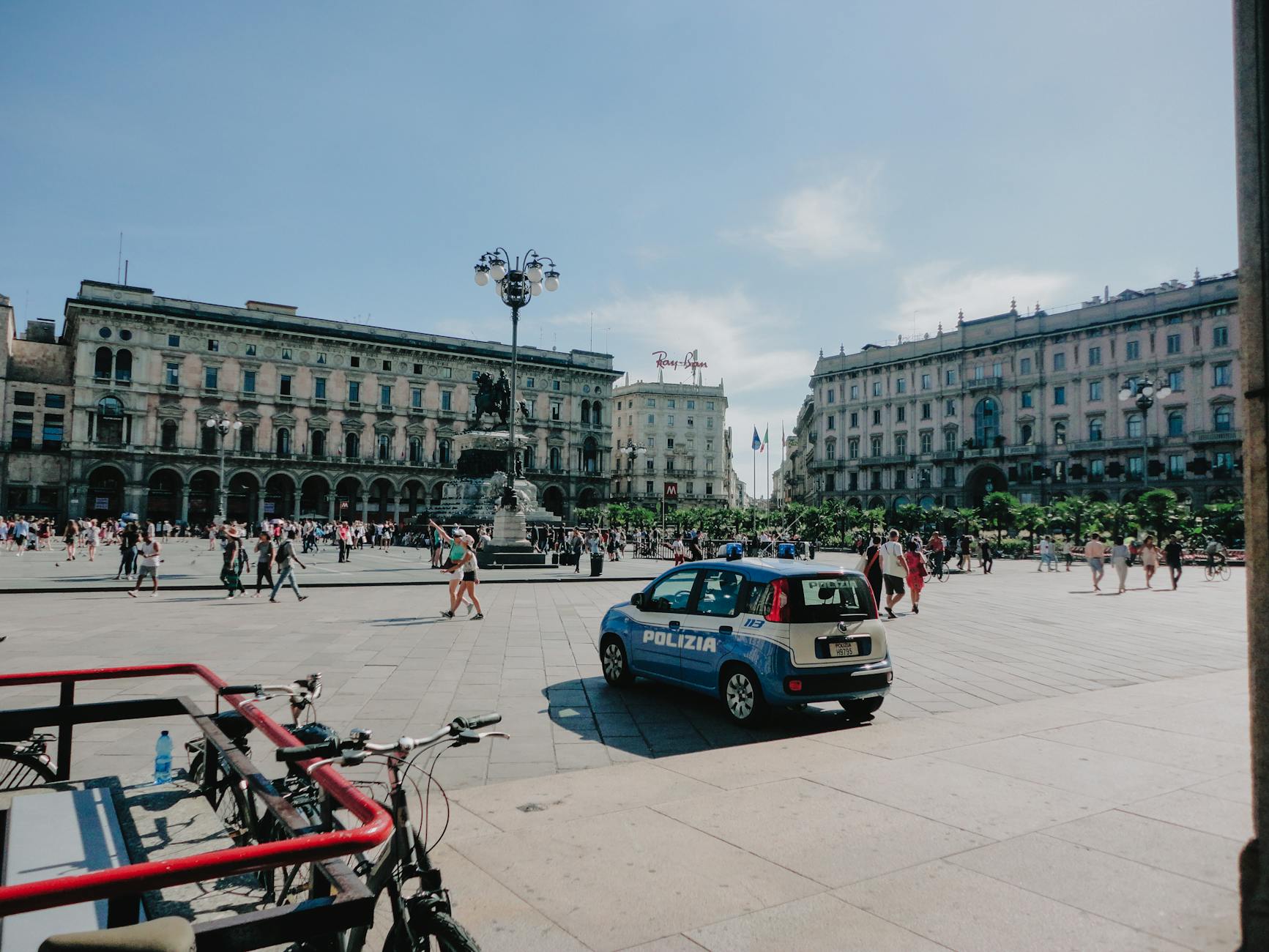 Busy piazza scene in Milan