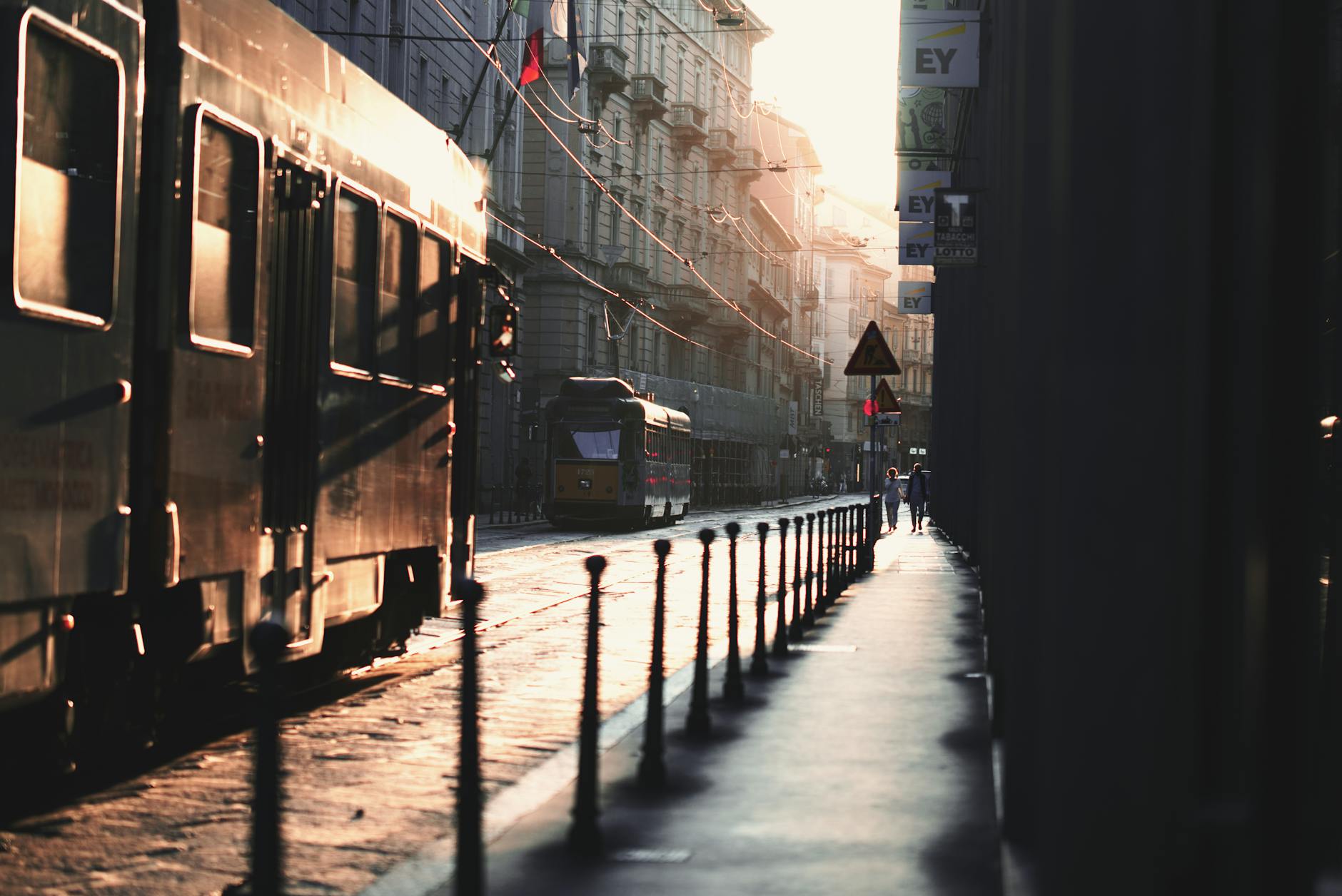 Tram in central Milan at sunset
