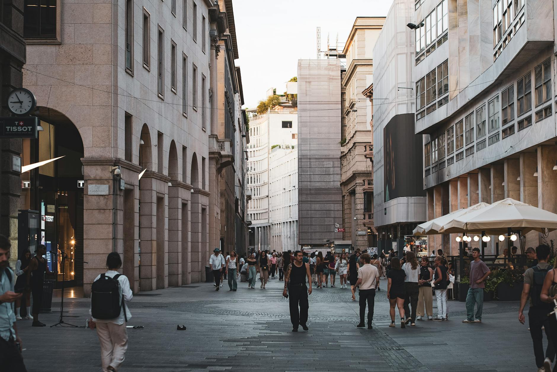 Busy Milan street with historic architecture