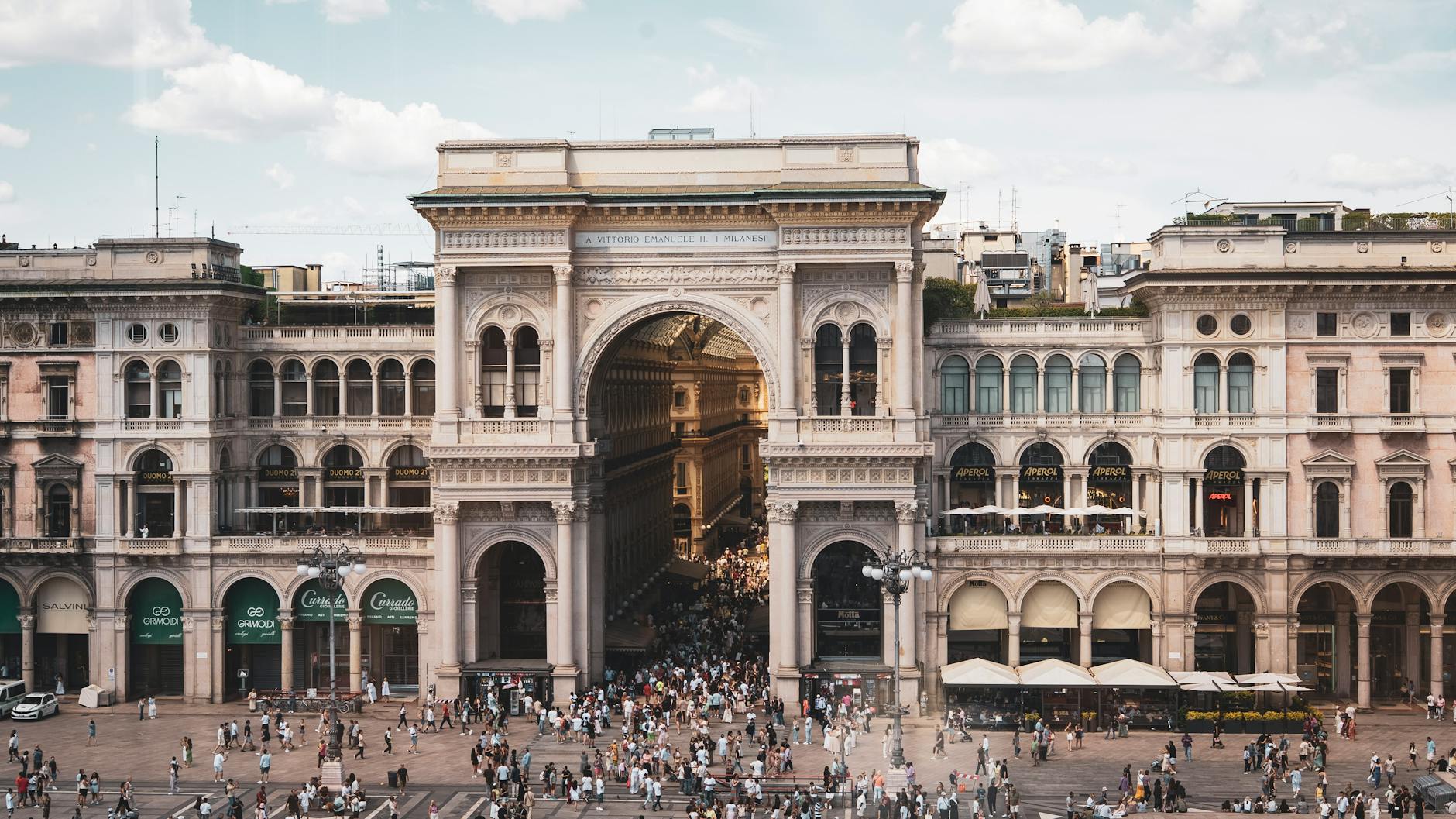 Crowded day inside Galleria Vittorio Emanuele II in Milan