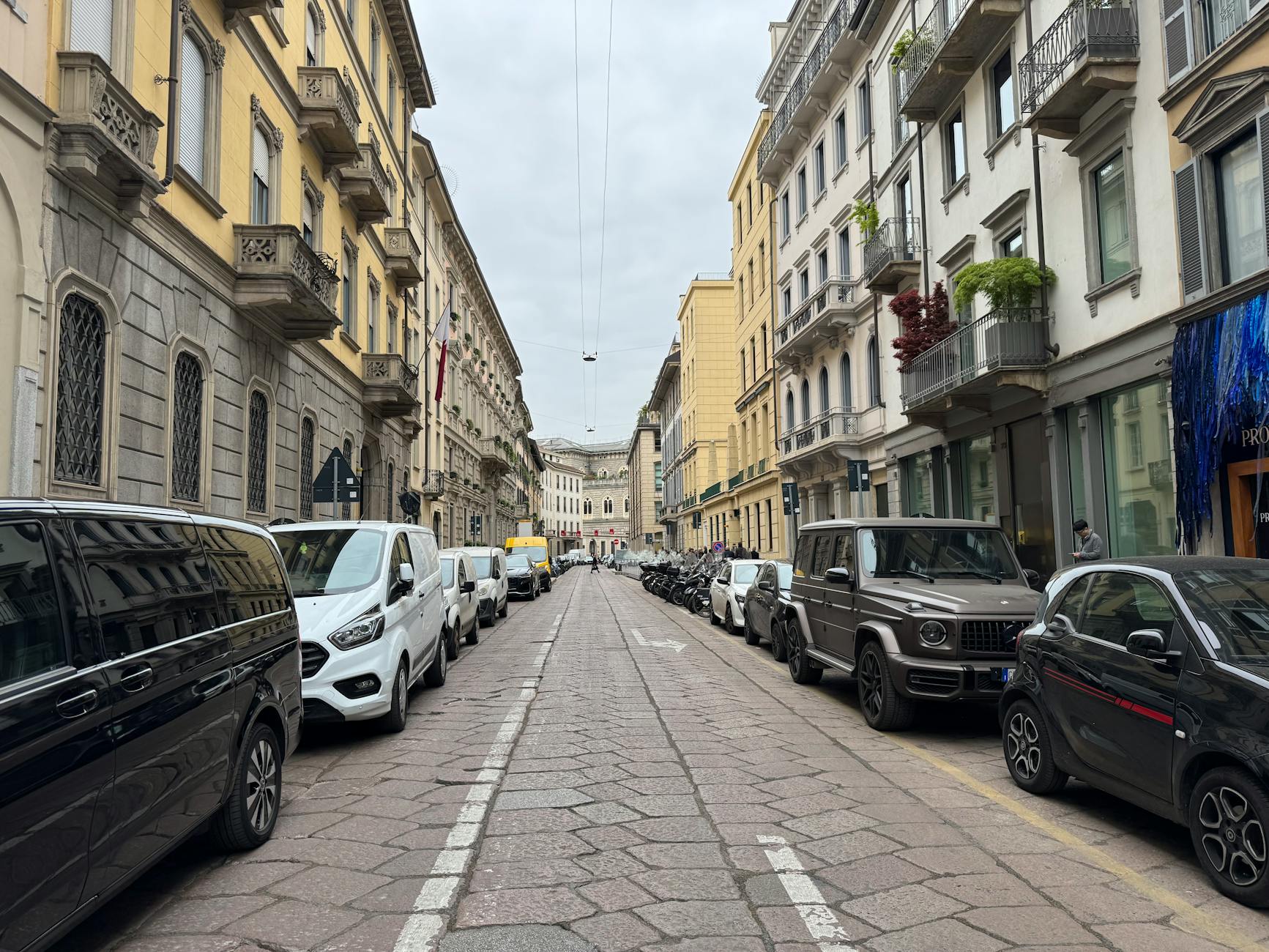 Classic Milan street with parked cars