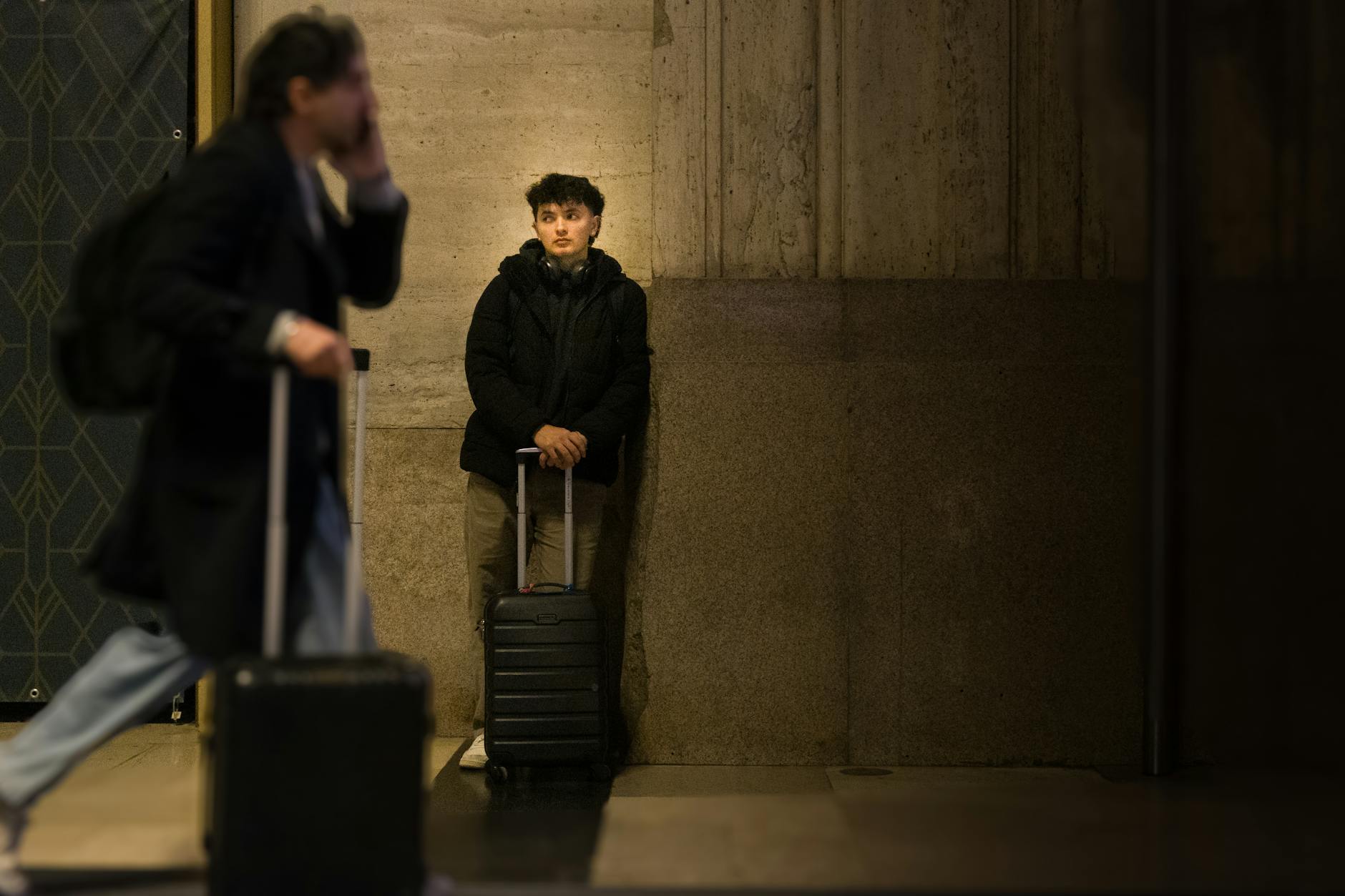 Travelers with luggage at Milano Centrale