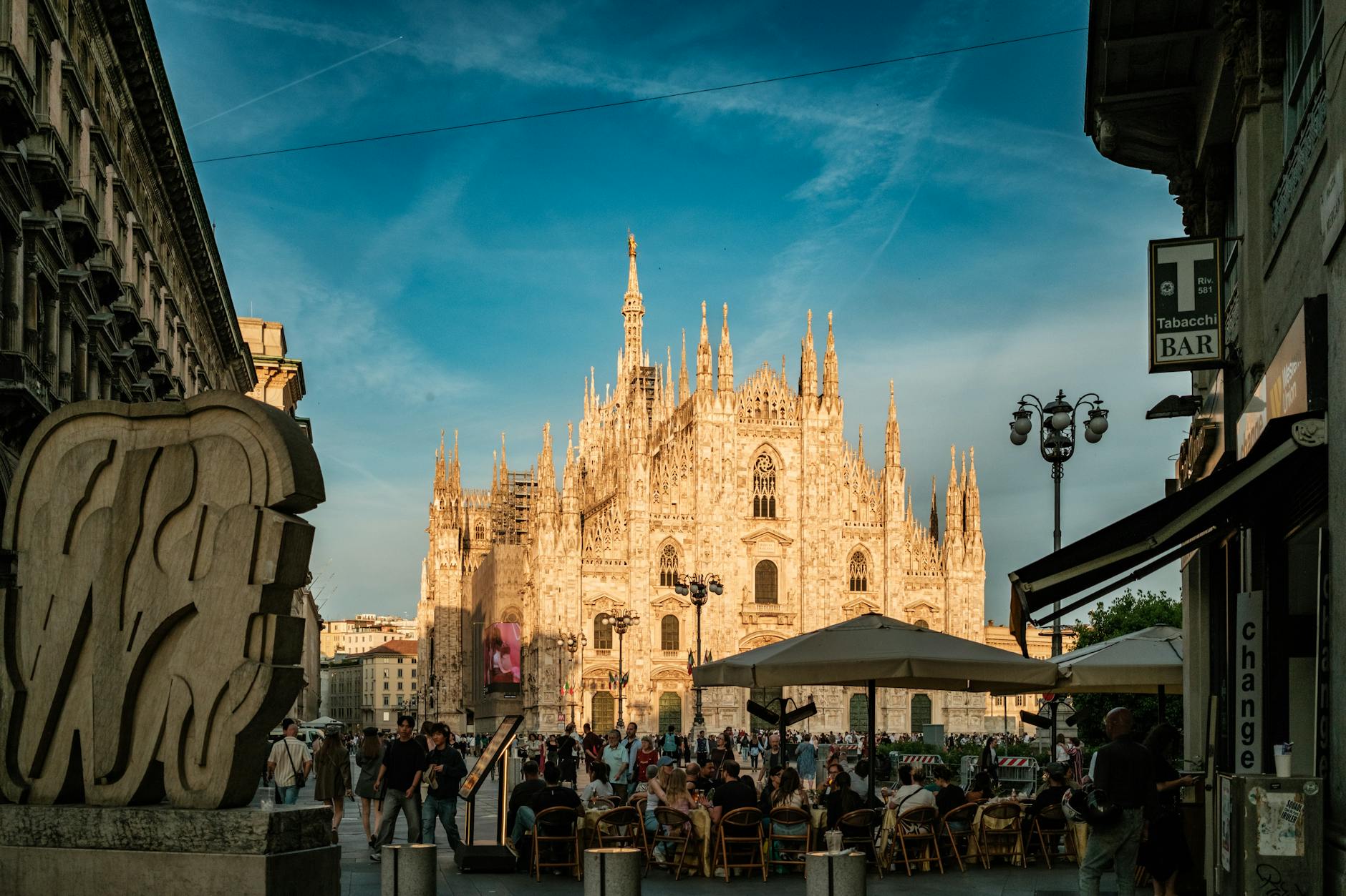 Evening crowds near the Duomo in Milan