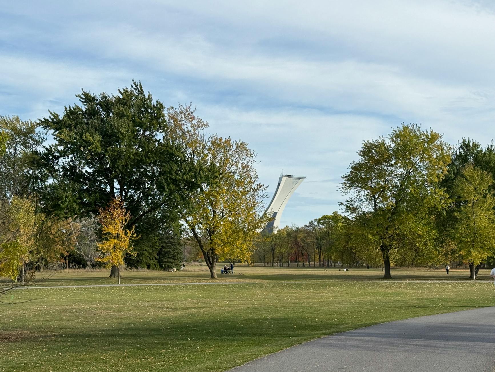 Autumn park with Montreal Olympic Tower in the distance