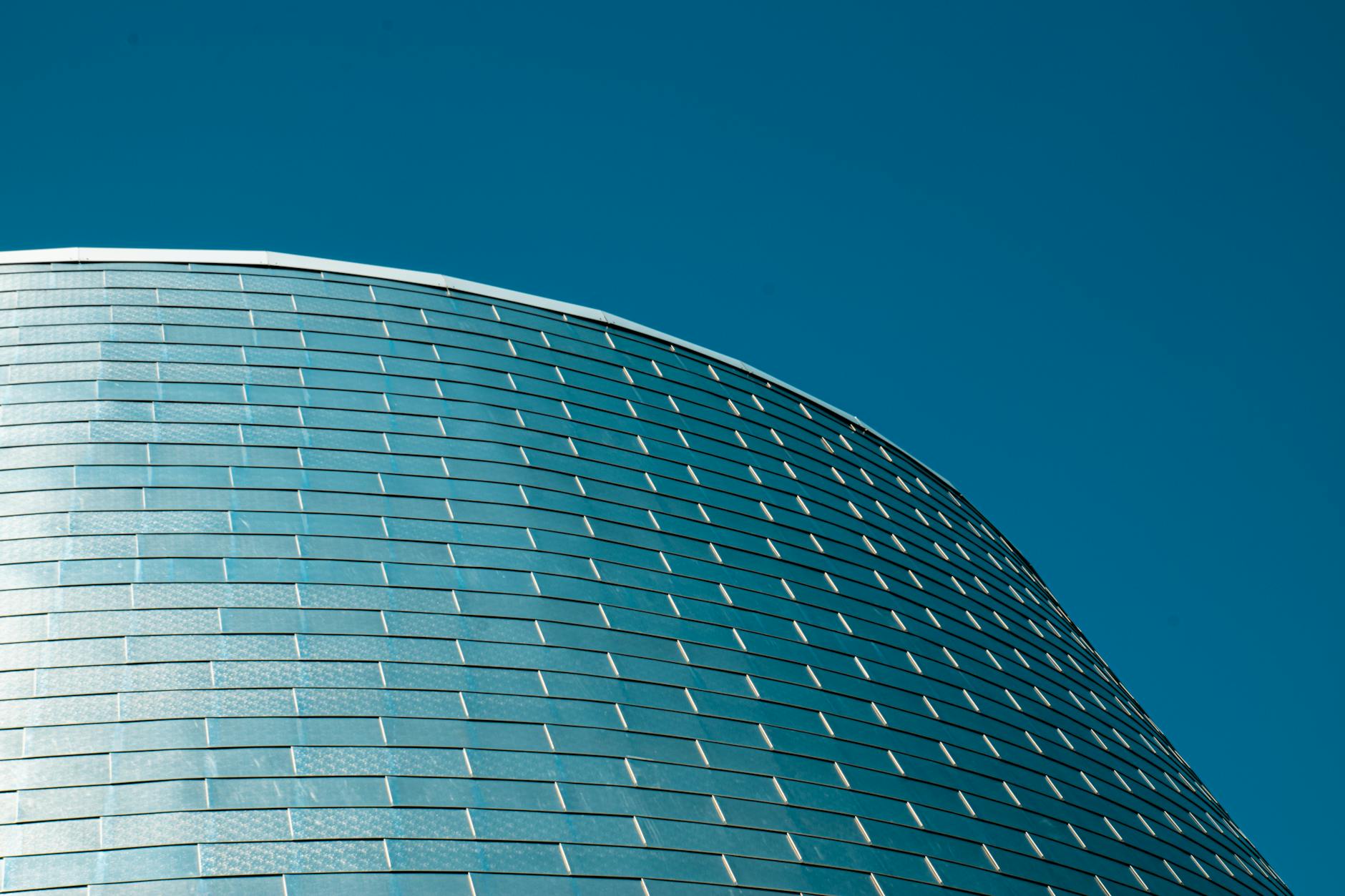 Modern curved glass building in Montreal