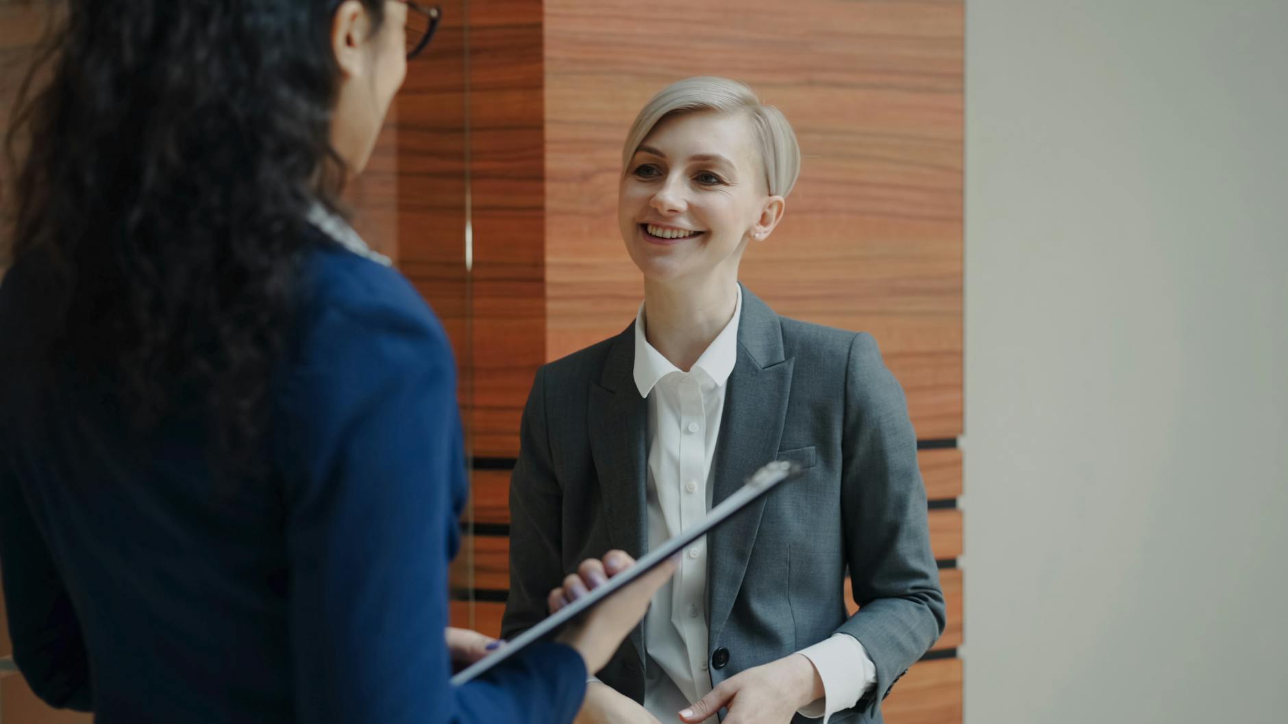 Two professionals in a business conversation
