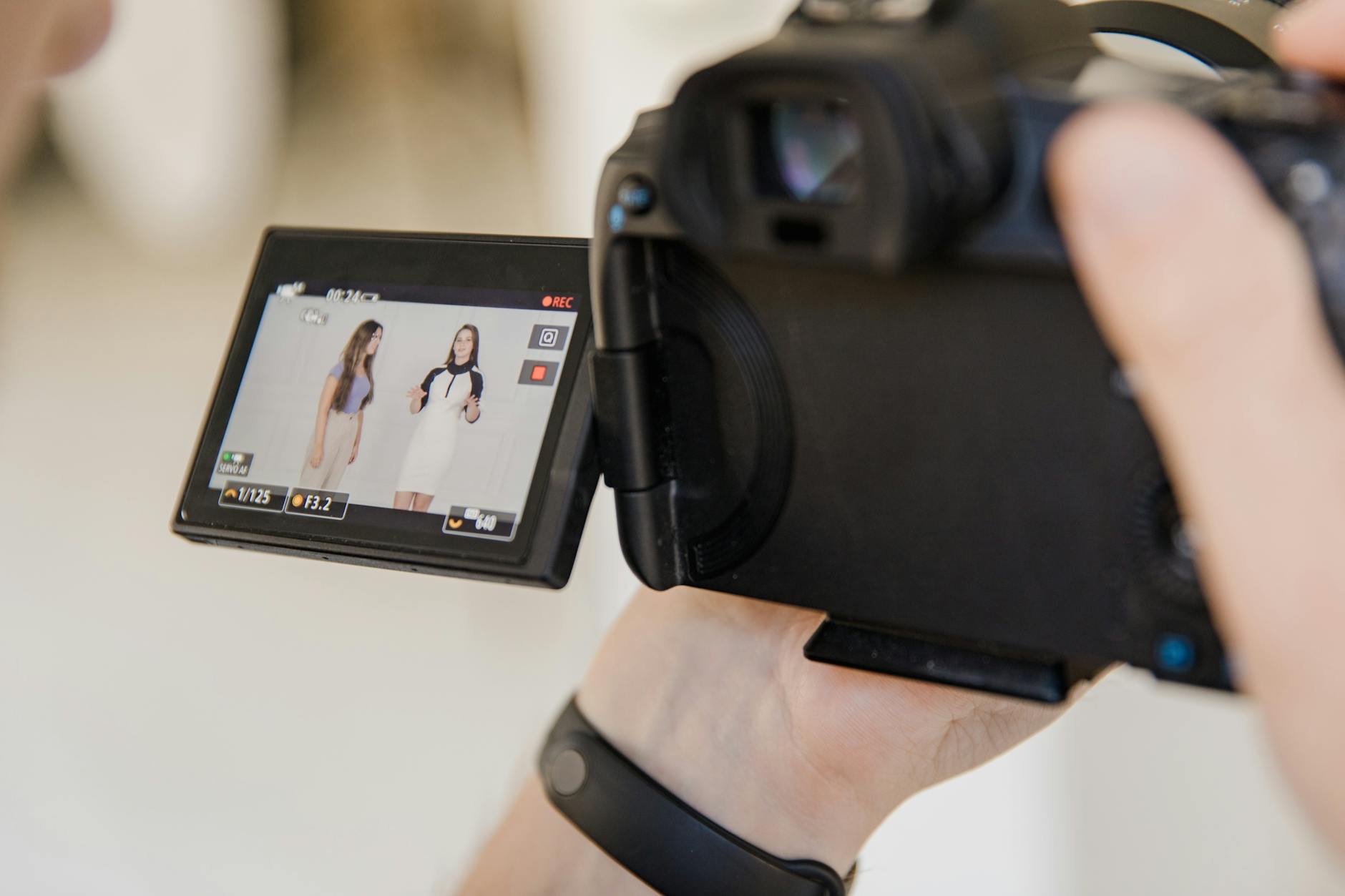 Digital camera screen recording two people
