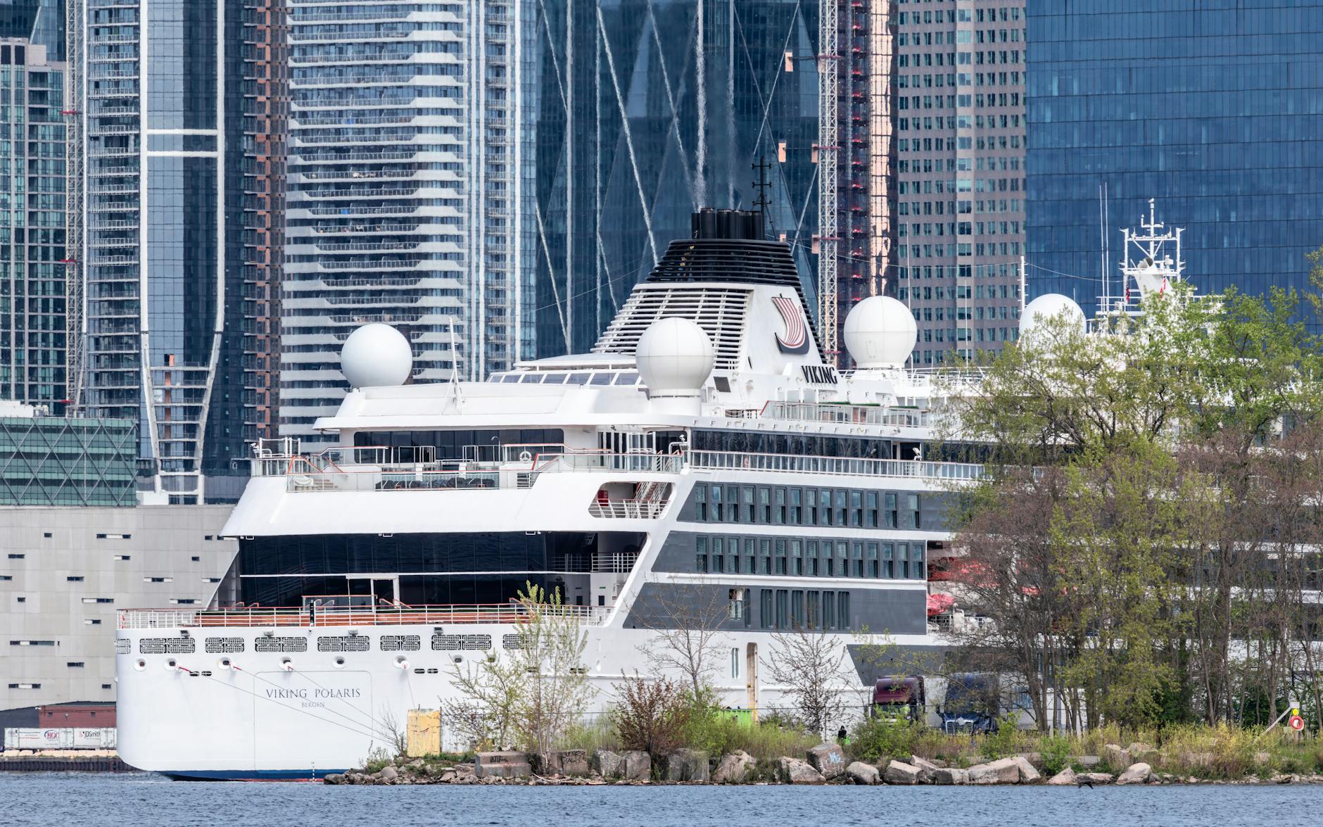 Cruise ship docked at an urban port