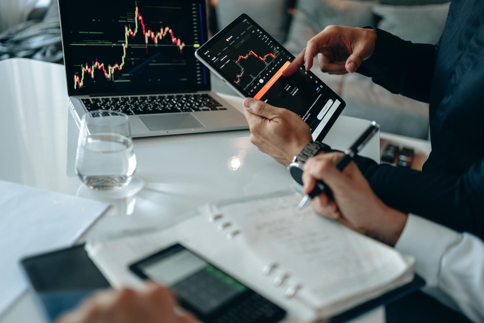 Business professionals reviewing financial charts