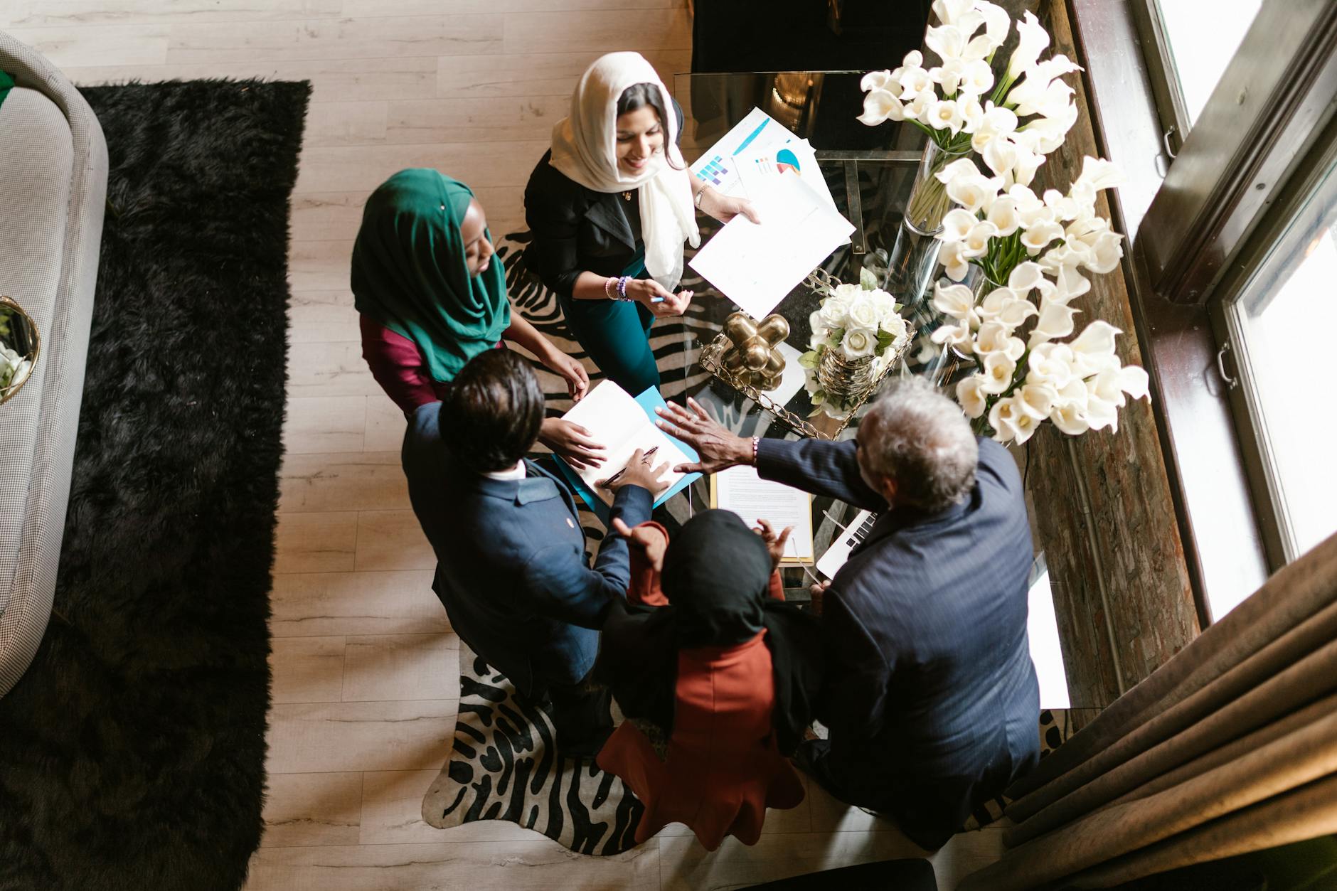 Professionals collaborating around a table