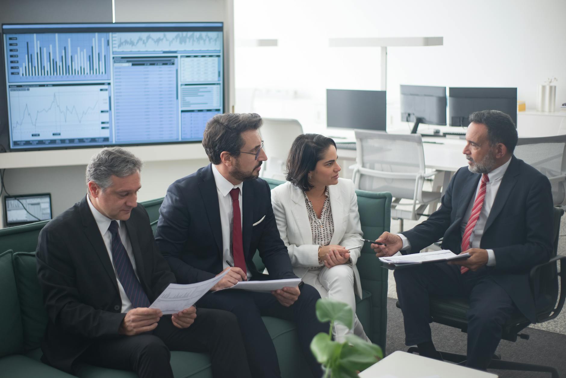 Professionals discussing financial strategy