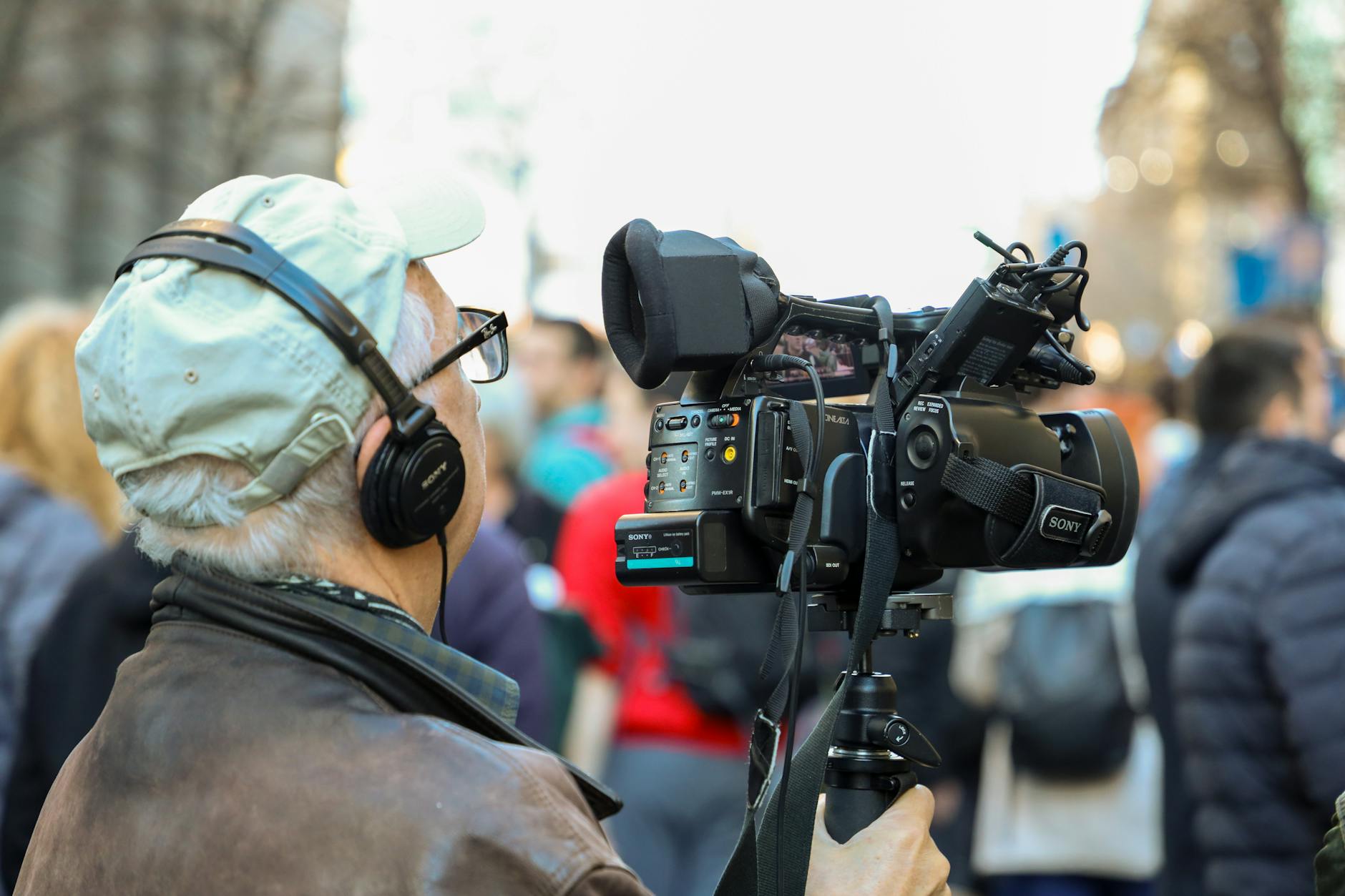 Cameraman recording an urban event