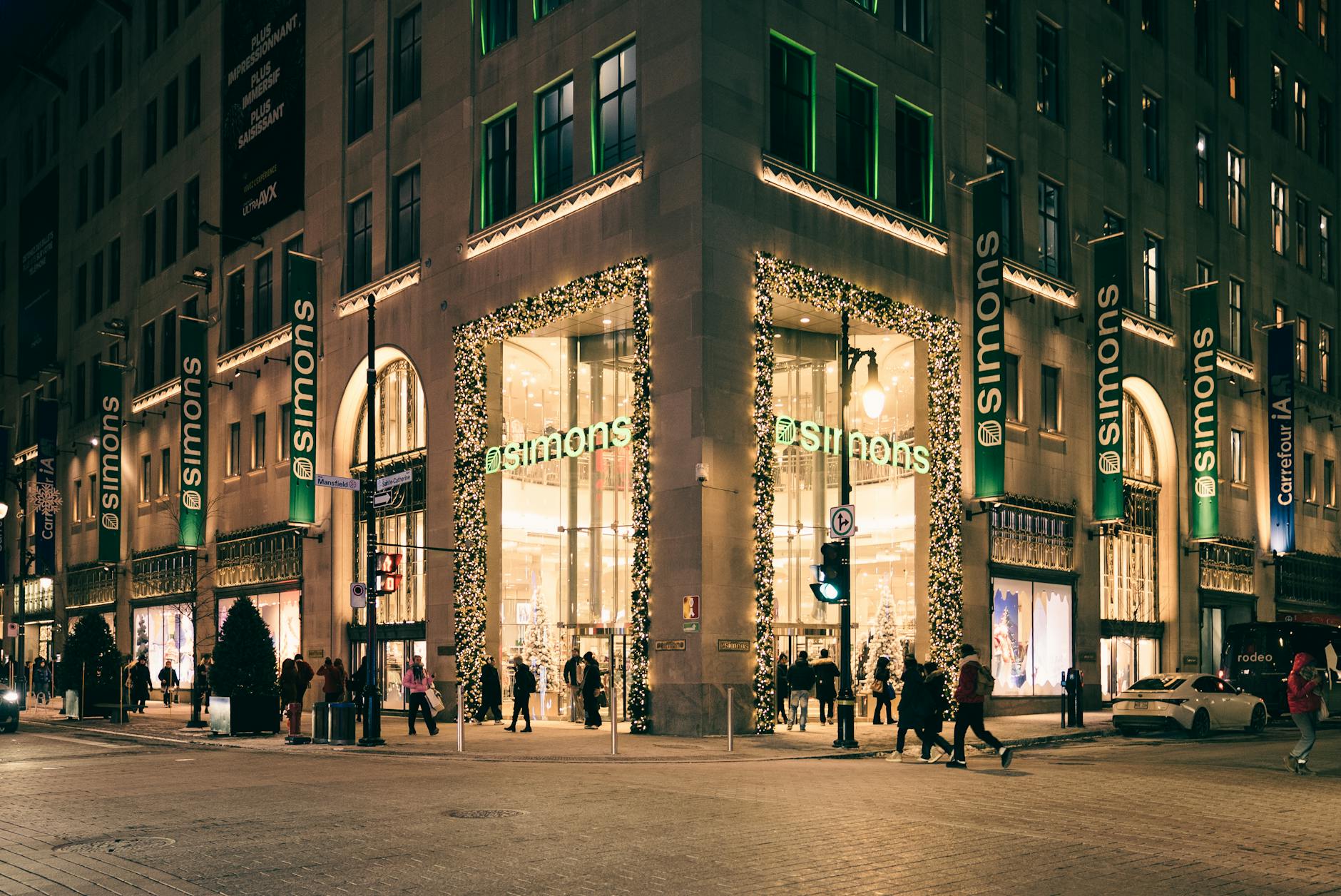 Simons storefront in Montreal at night