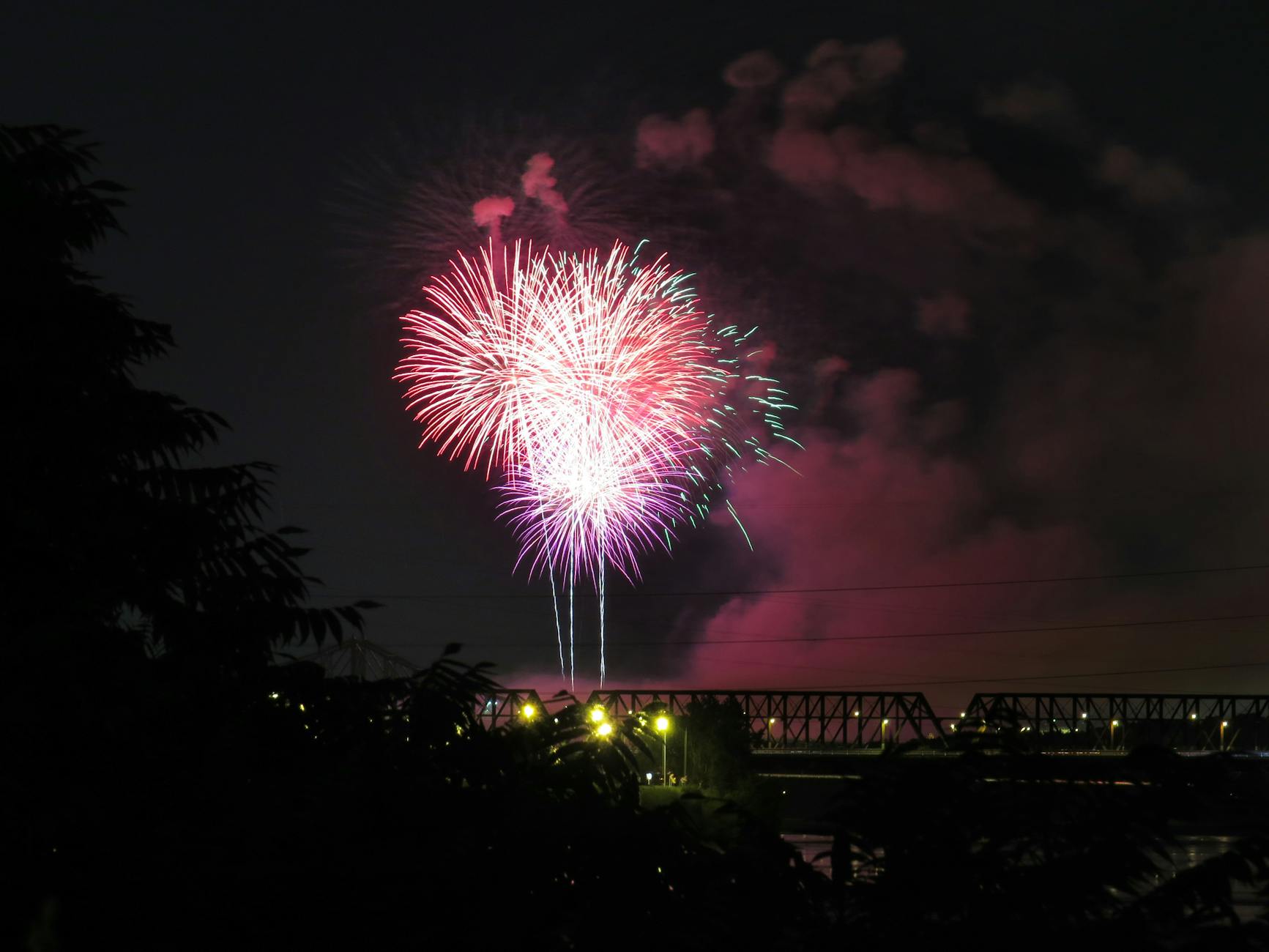 Fireworks over a bridge in Montreal