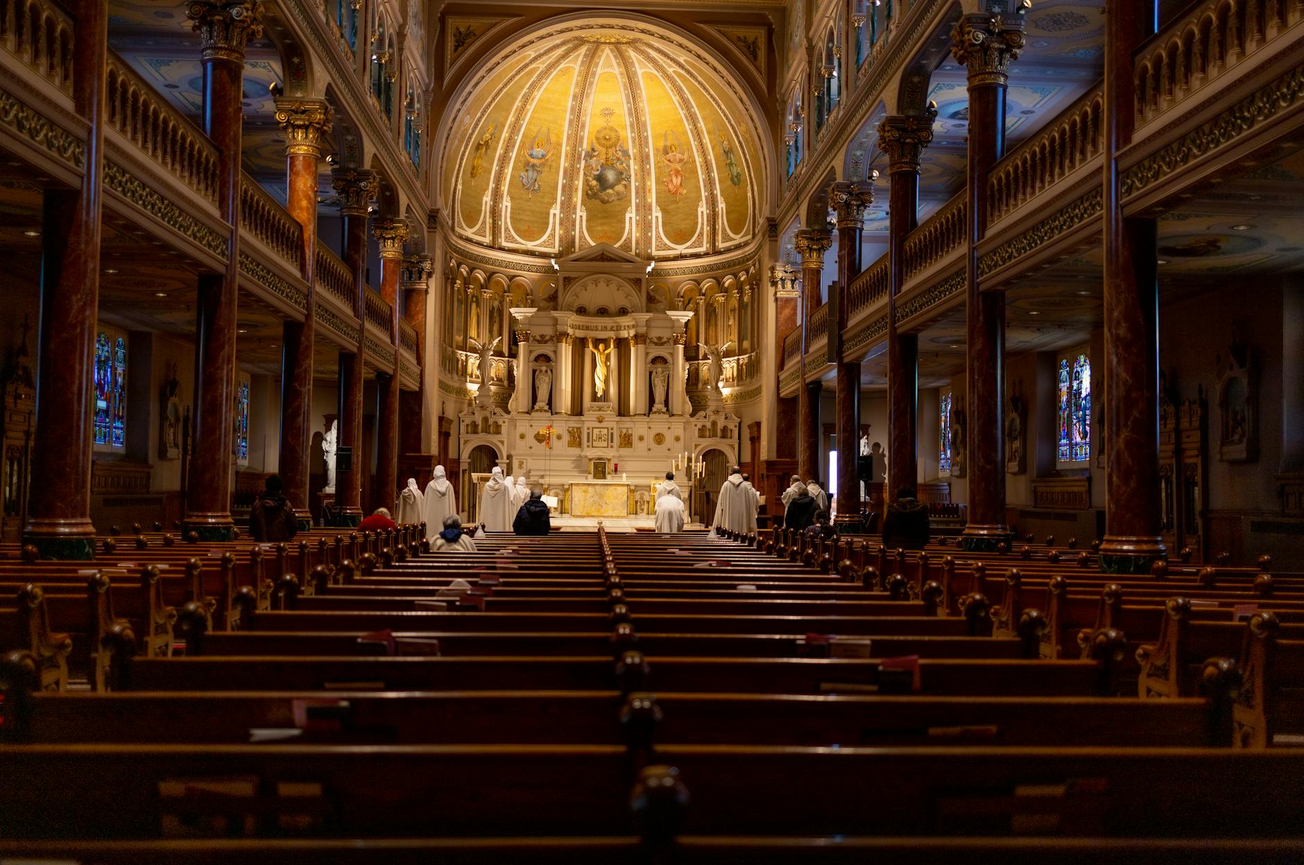 People praying inside a Montreal church