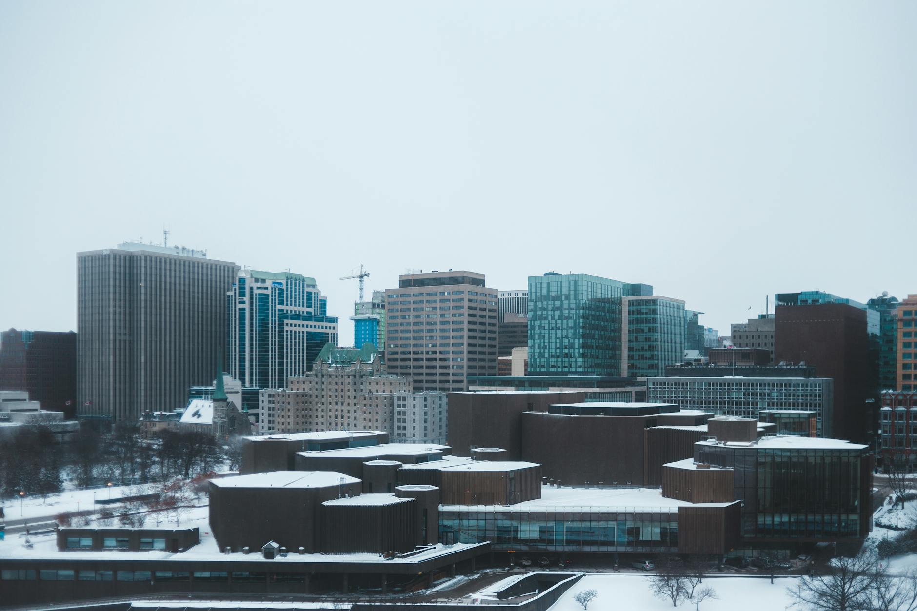 Snow-covered modern city skyline