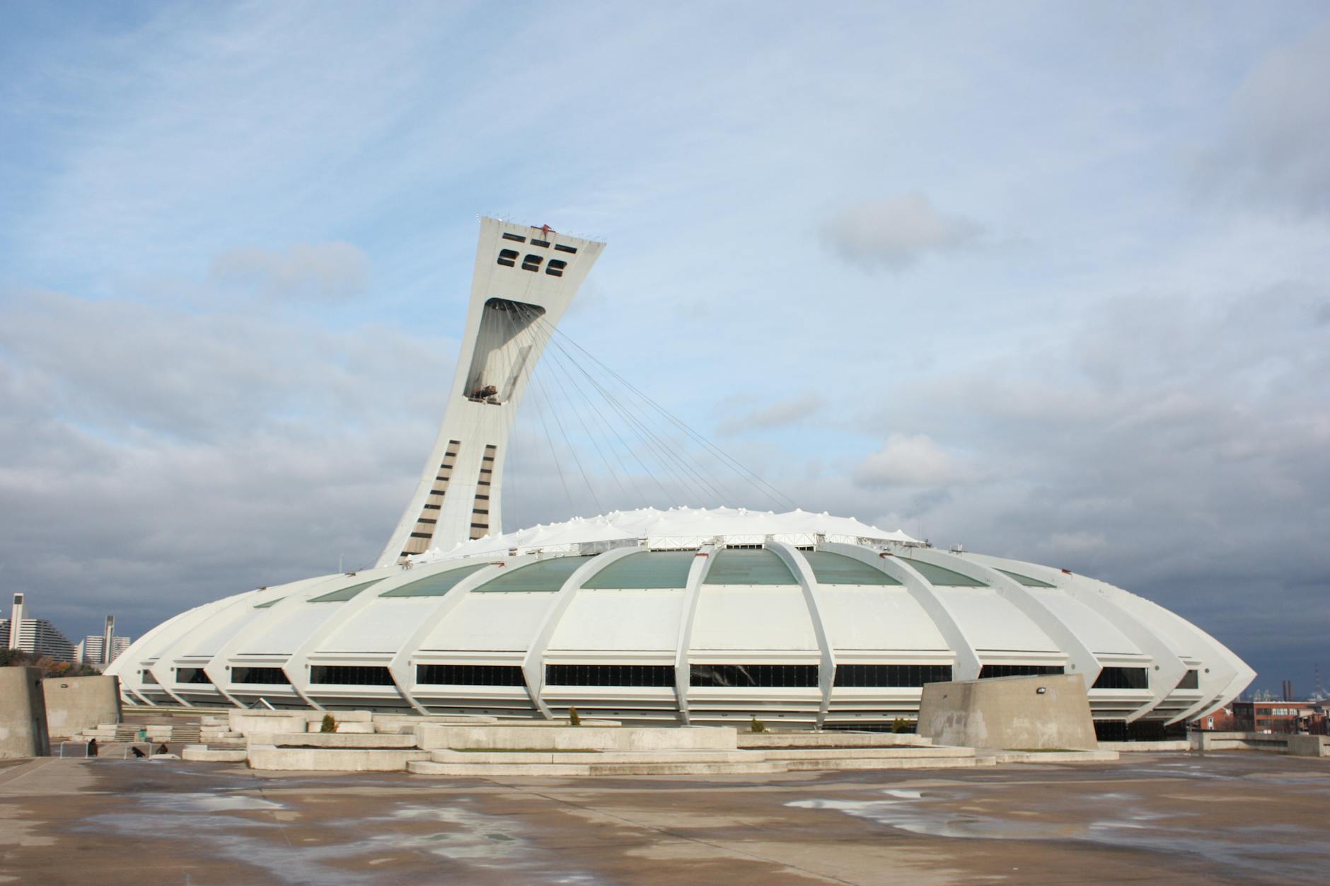 Montreal Olympic Stadium under a cloudy sky