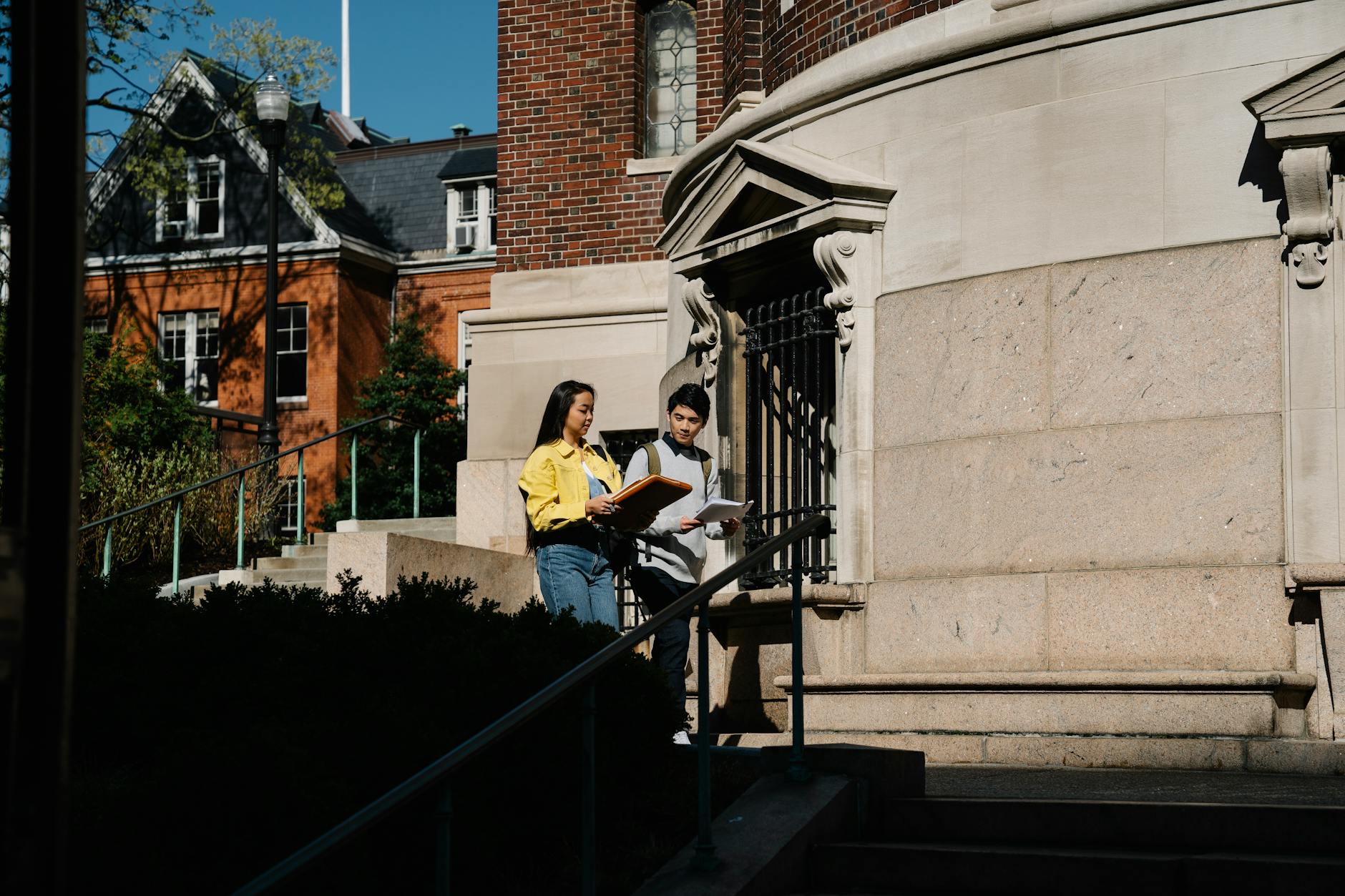 Students talking outside a campus building