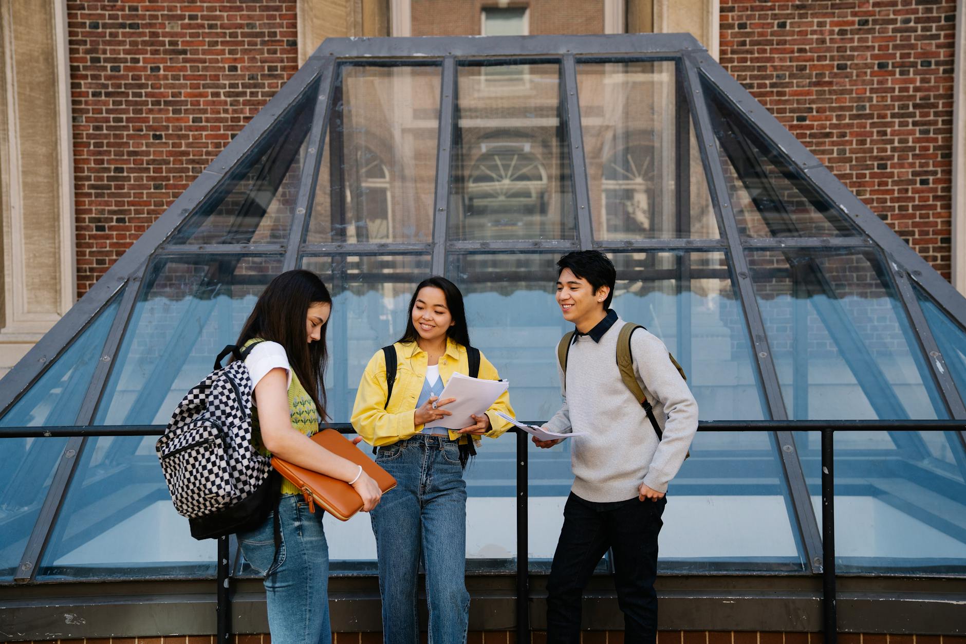 Students talking and studying on a campus