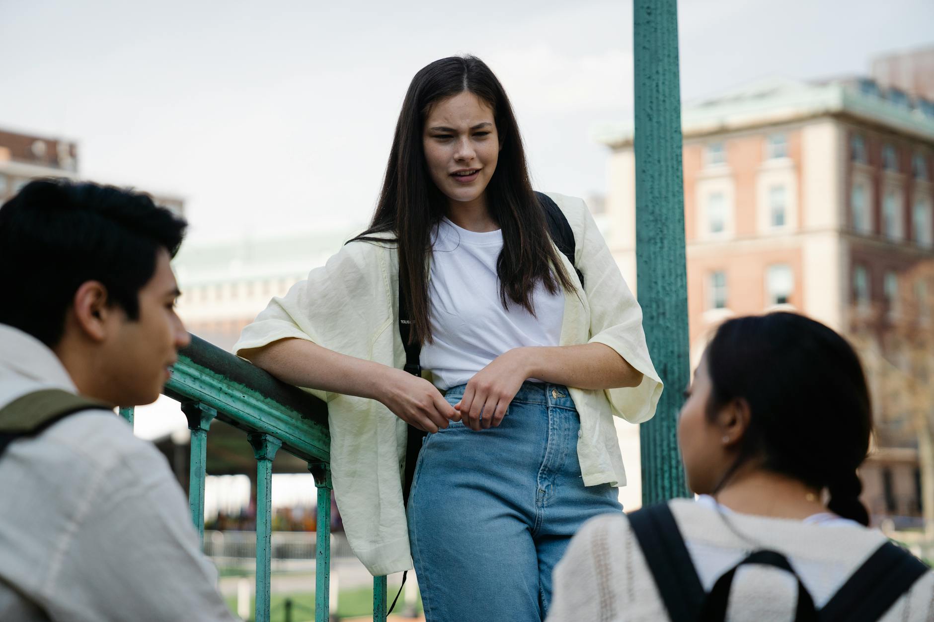 Students having a campus discussion outdoors