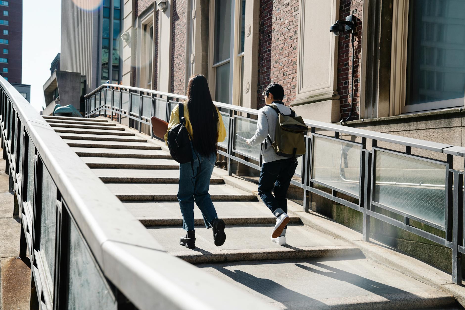 Students walking toward a university building