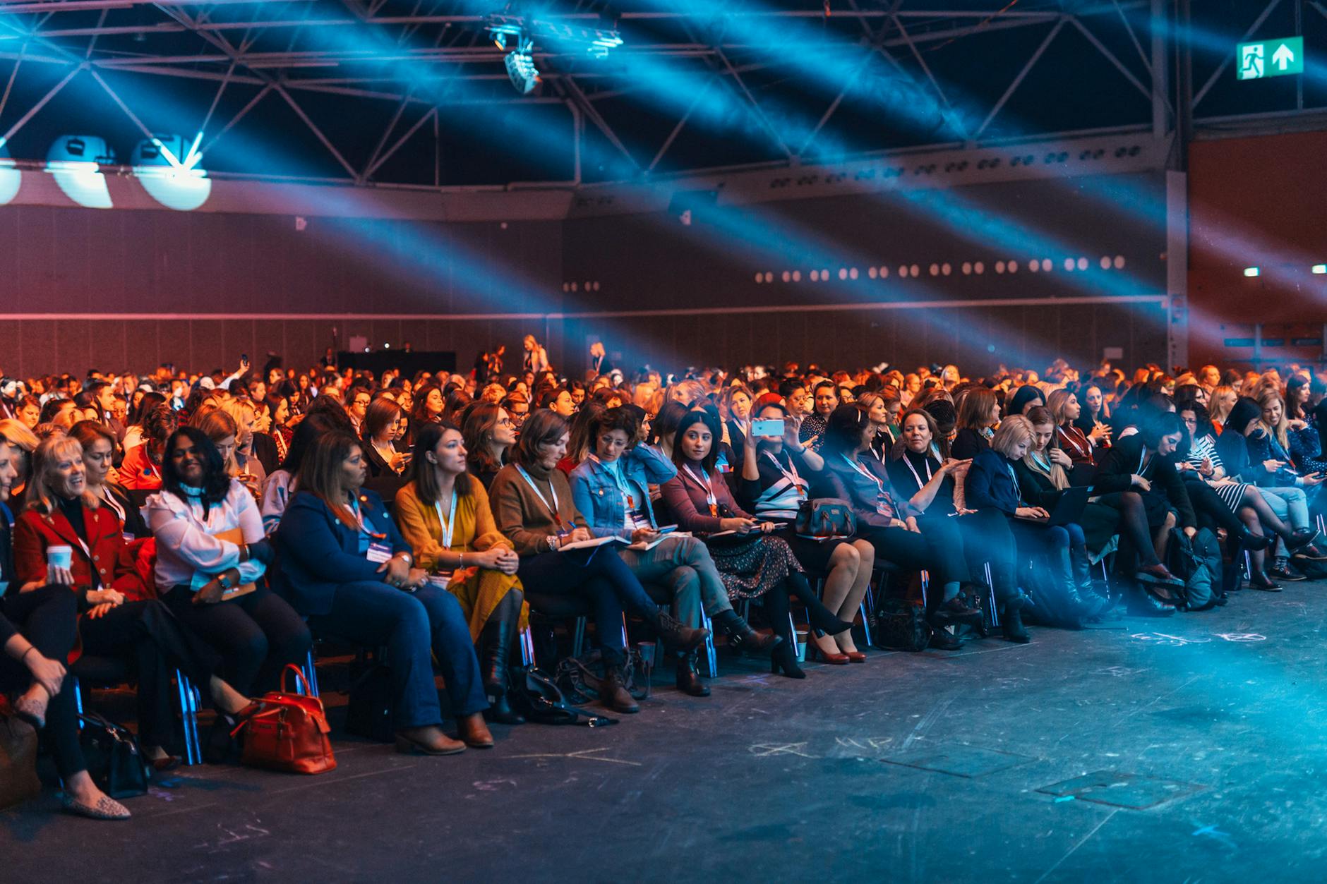 Large audience seated in an auditorium