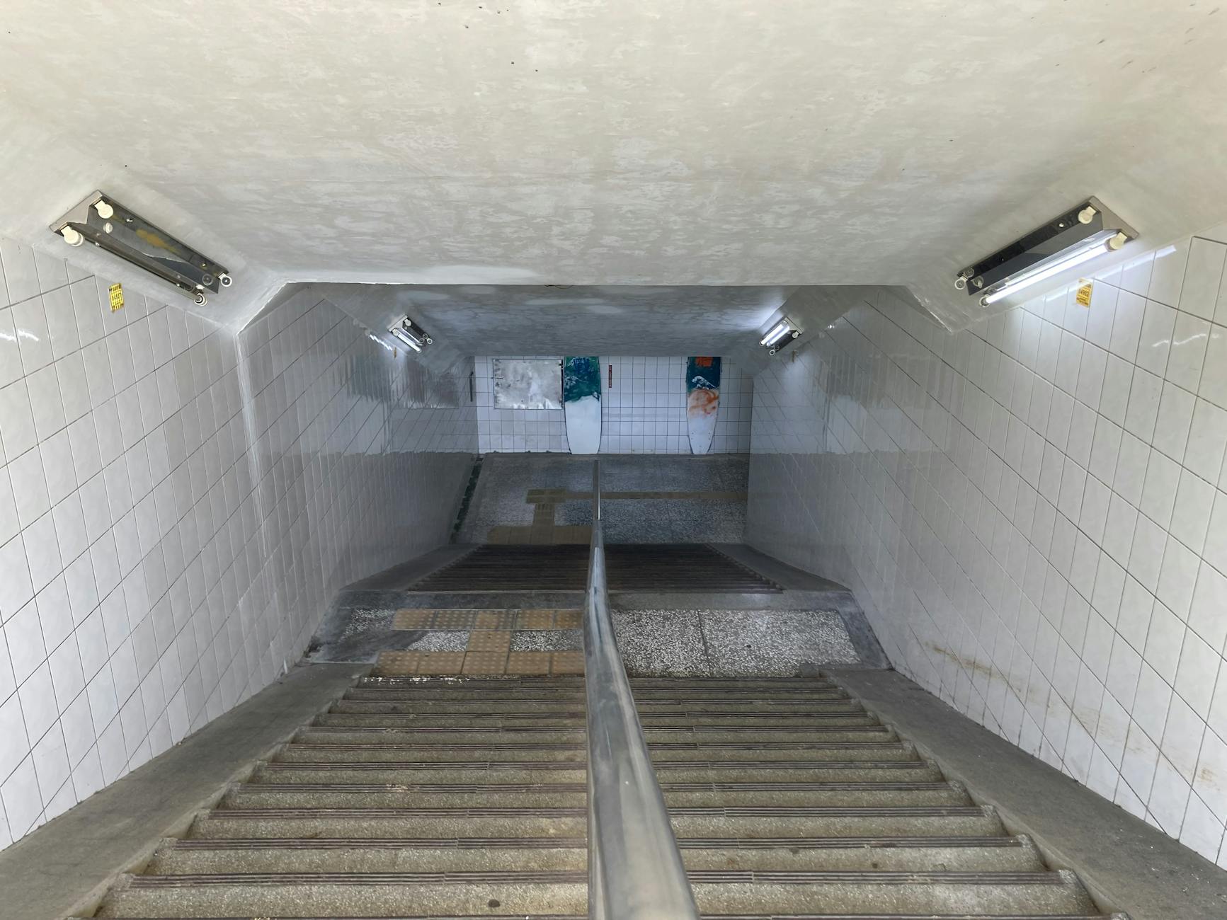 Station stairway with handrails