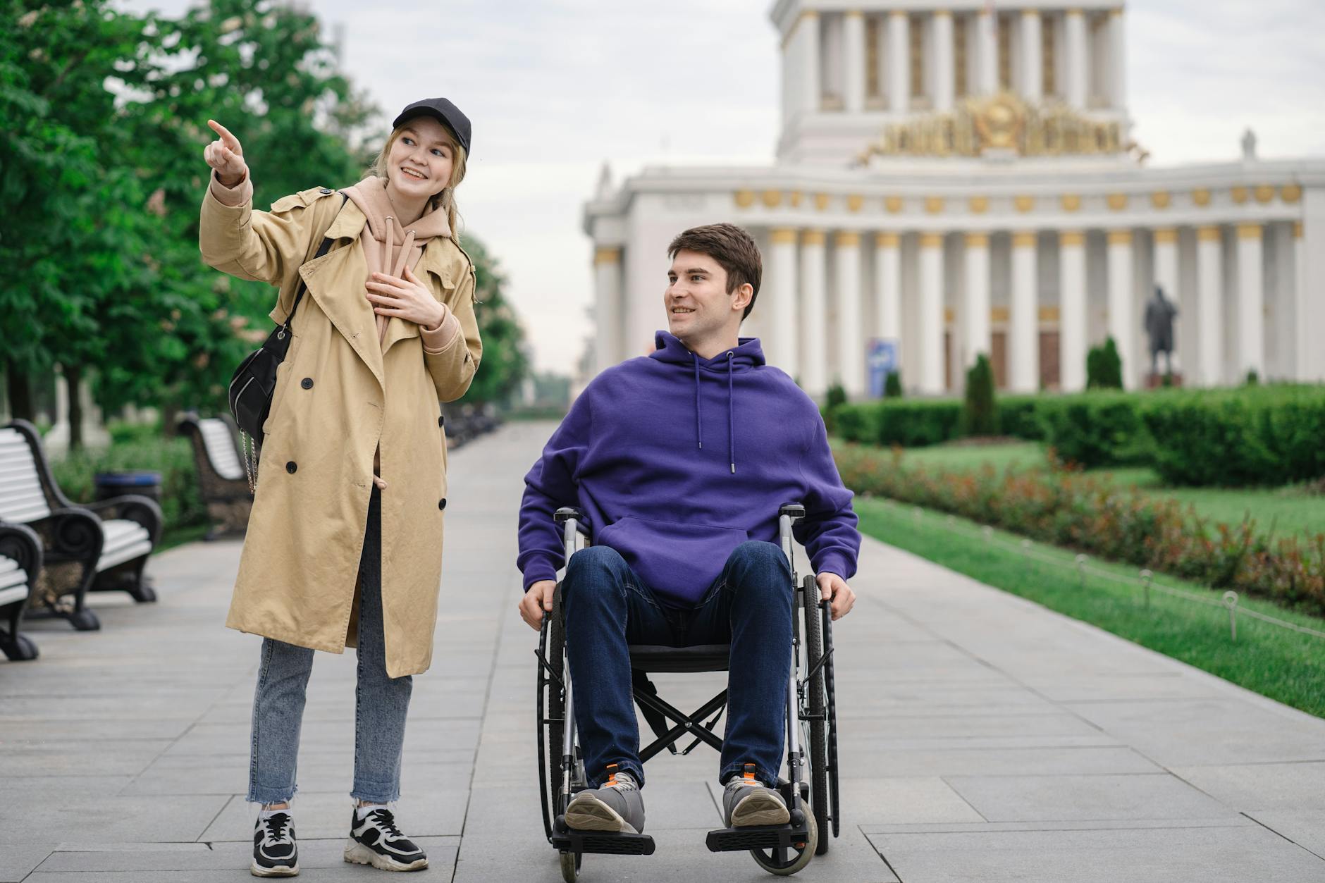 Traveler using a wheelchair outside a historic building