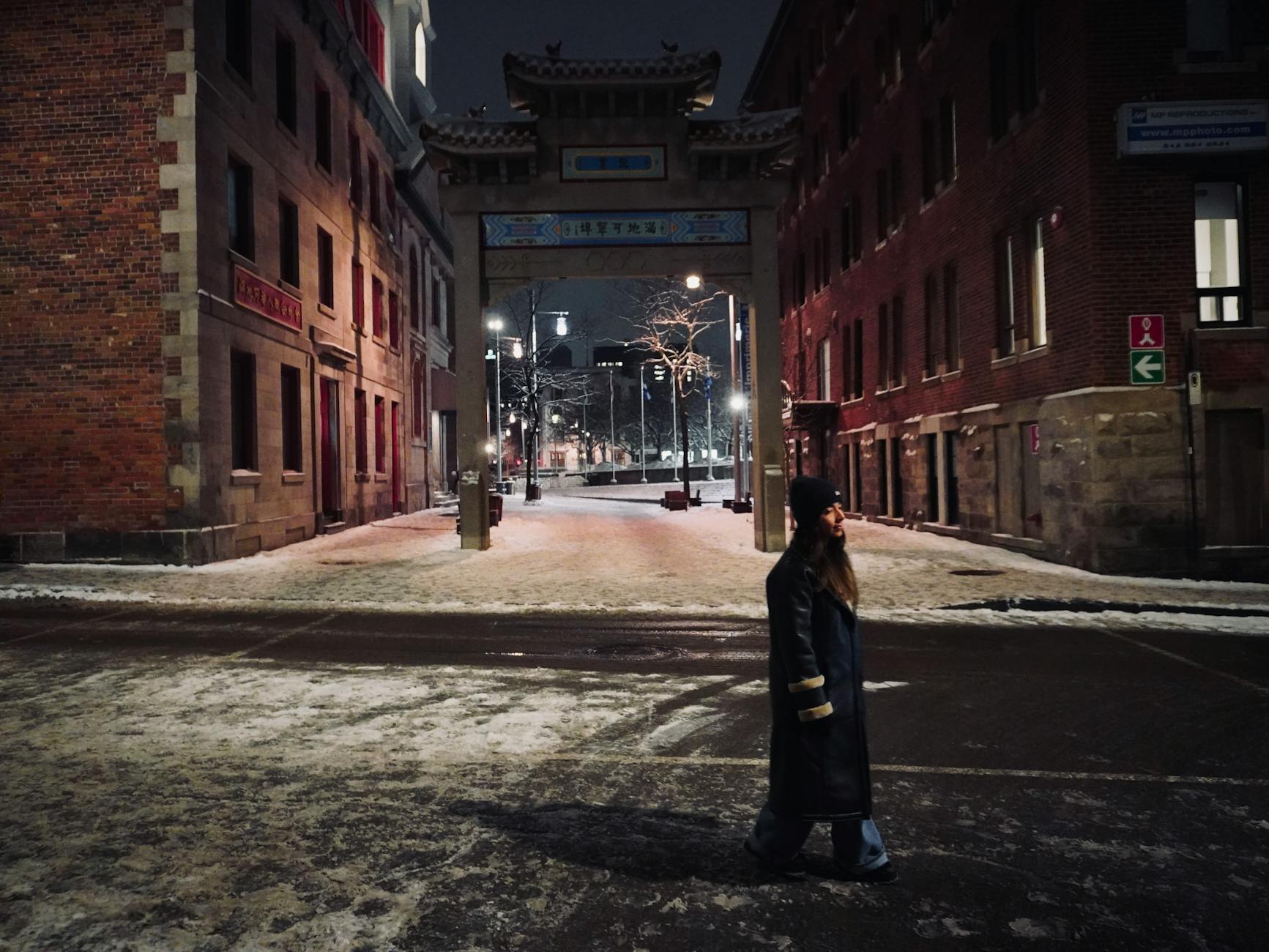 Snowy Montreal Chinatown gateway at night