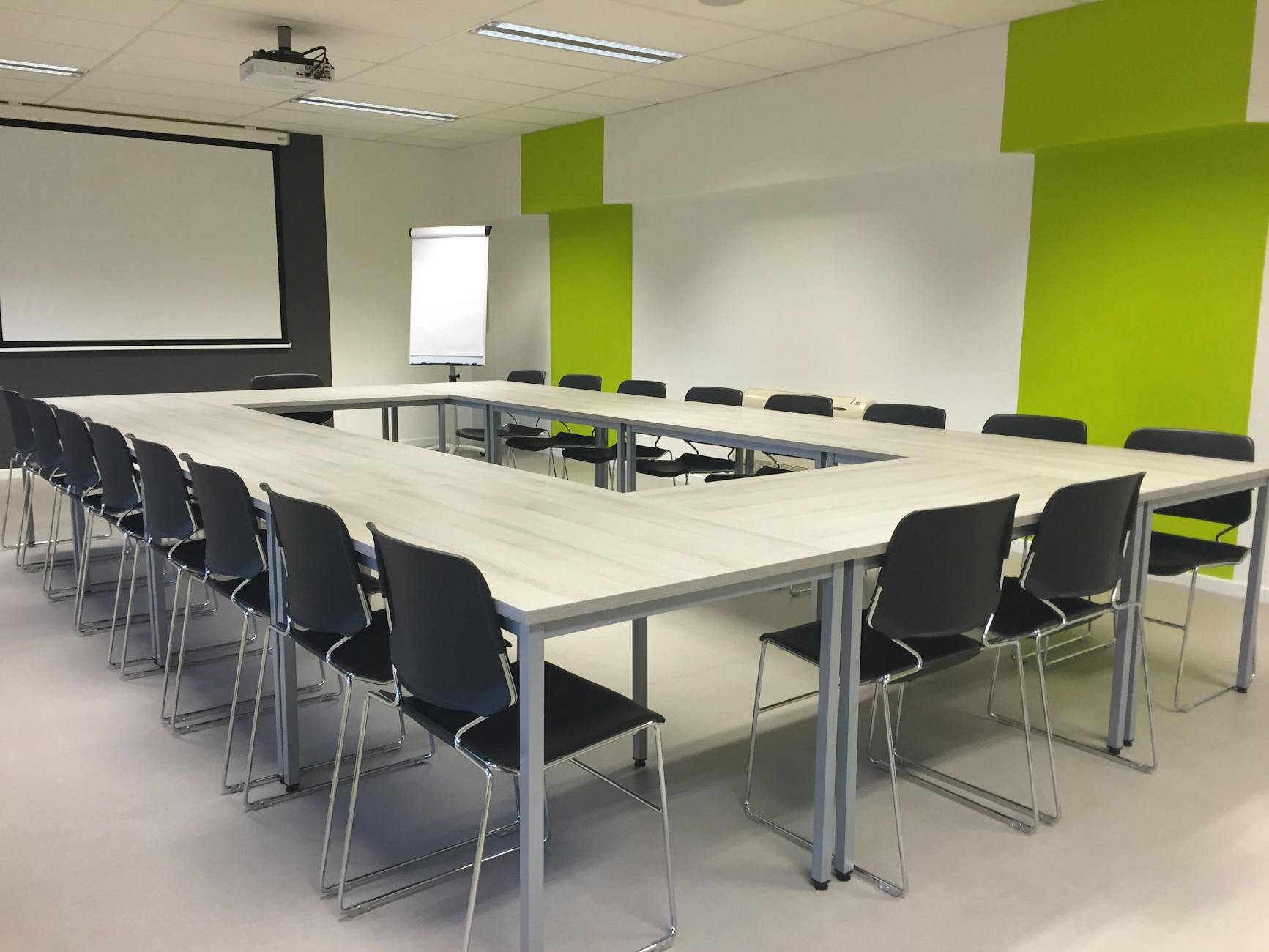 Modern conference room with U-shaped table