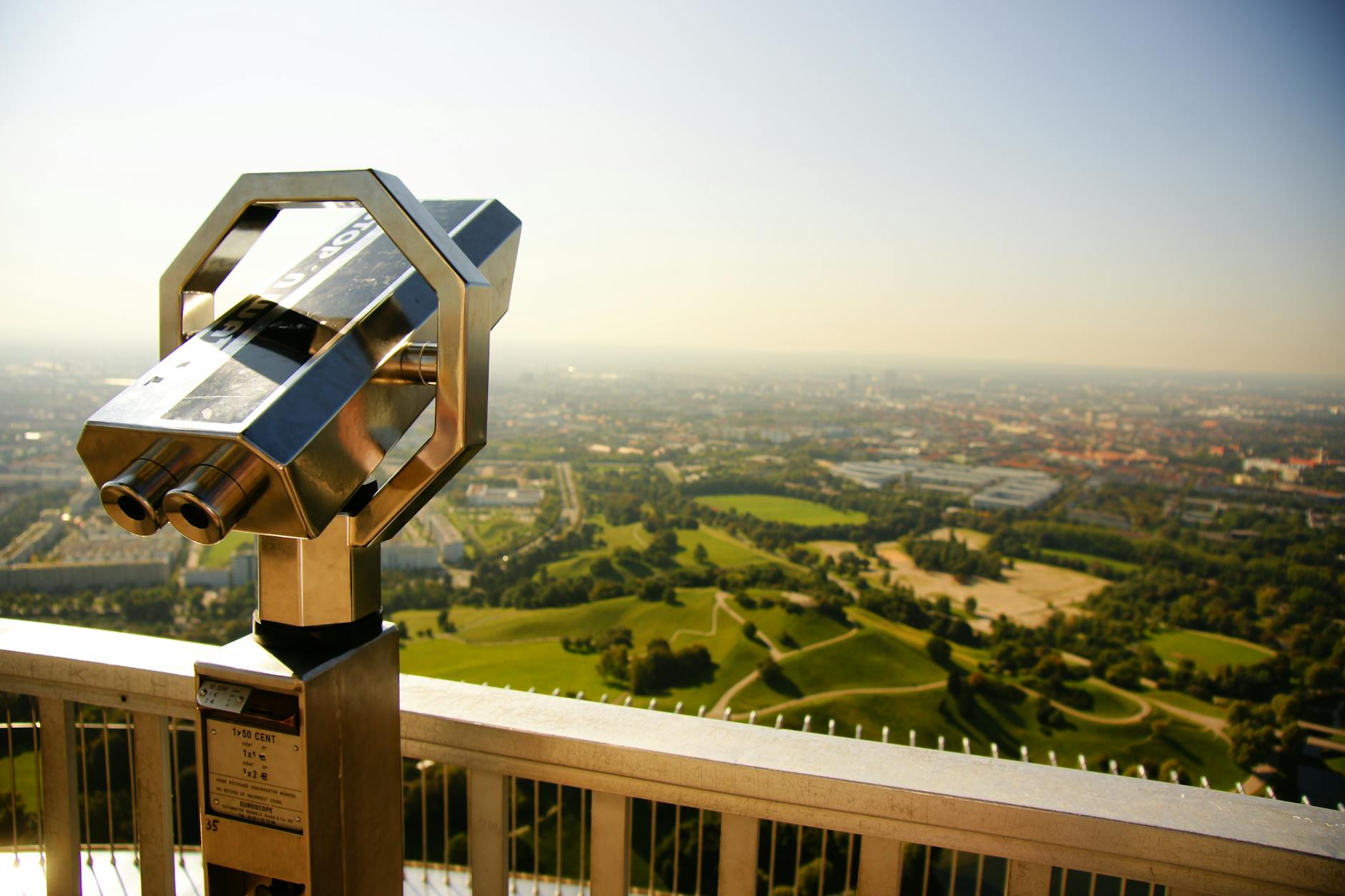 Munich skyline and green hills from an observation platform