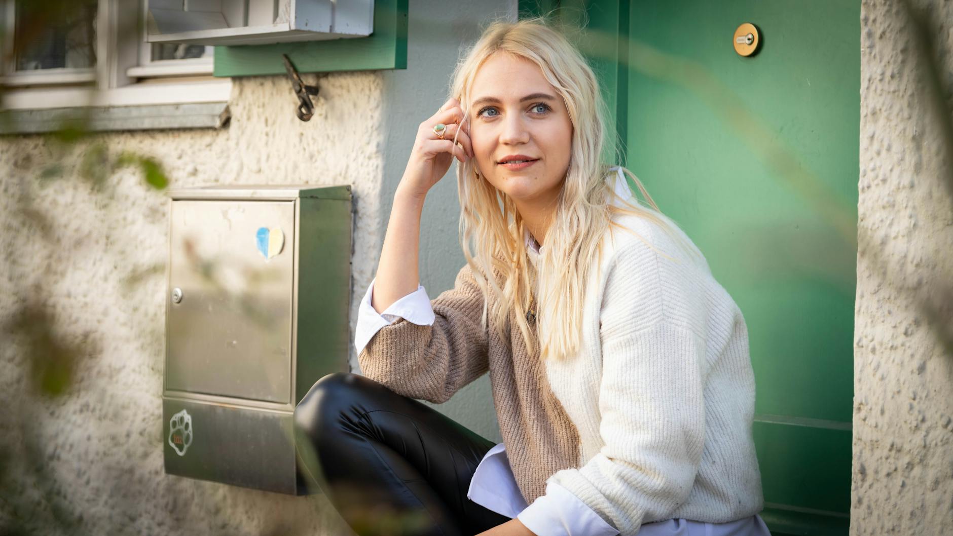 Portrait in Munich near a green door