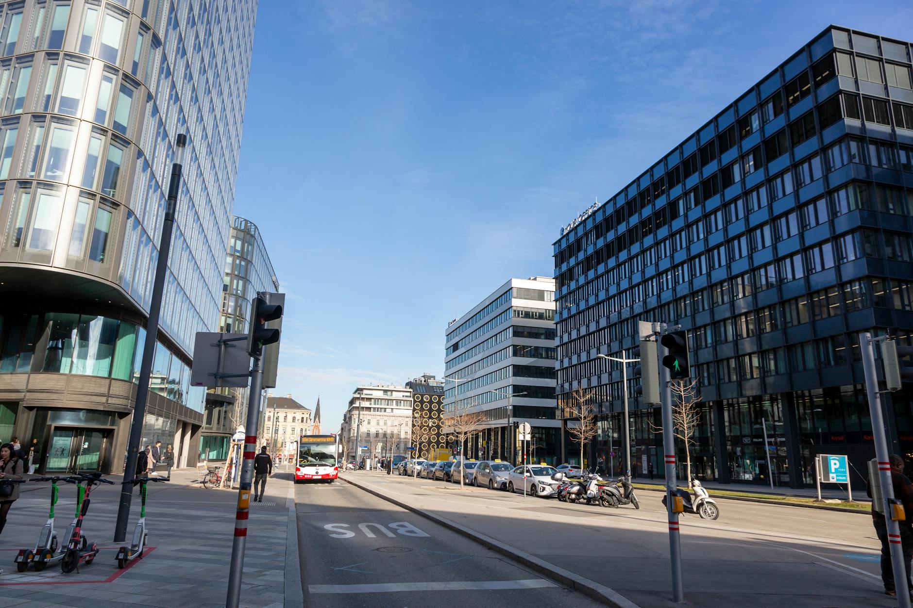 Modern Munich street with city traffic and contemporary architecture