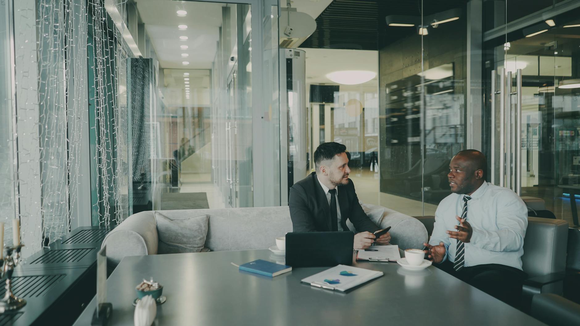 Businesspeople discussing strategy in a contemporary office