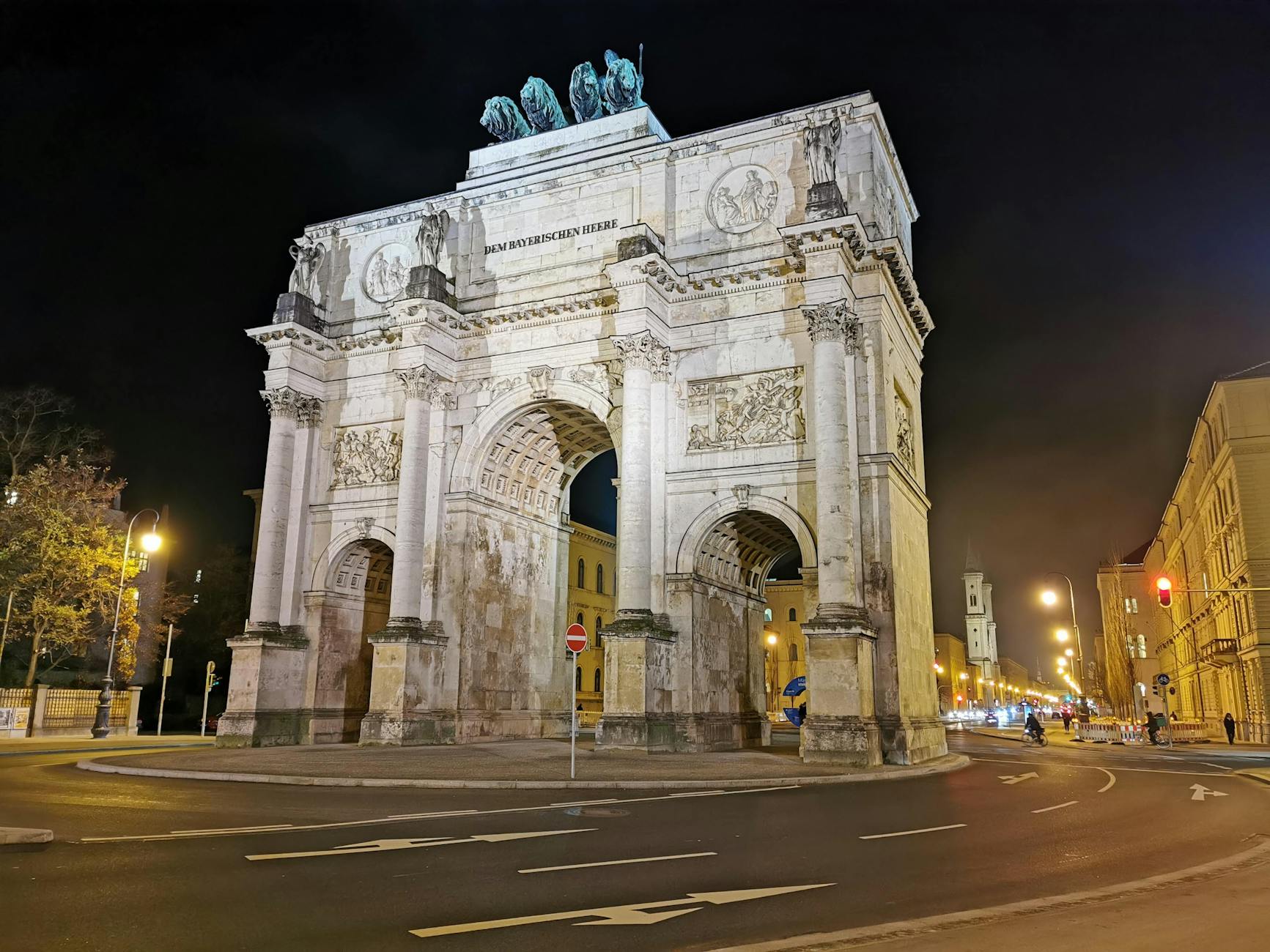 Siegestor arch in Munich lit at night