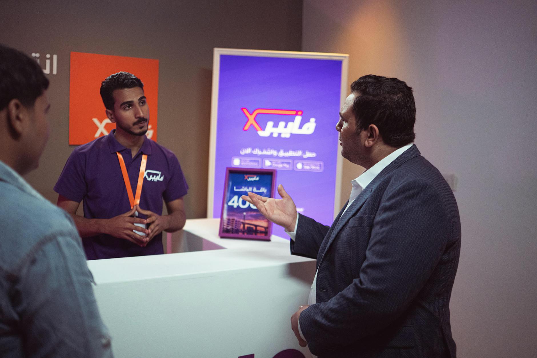 Customer interaction at a technology exhibit booth