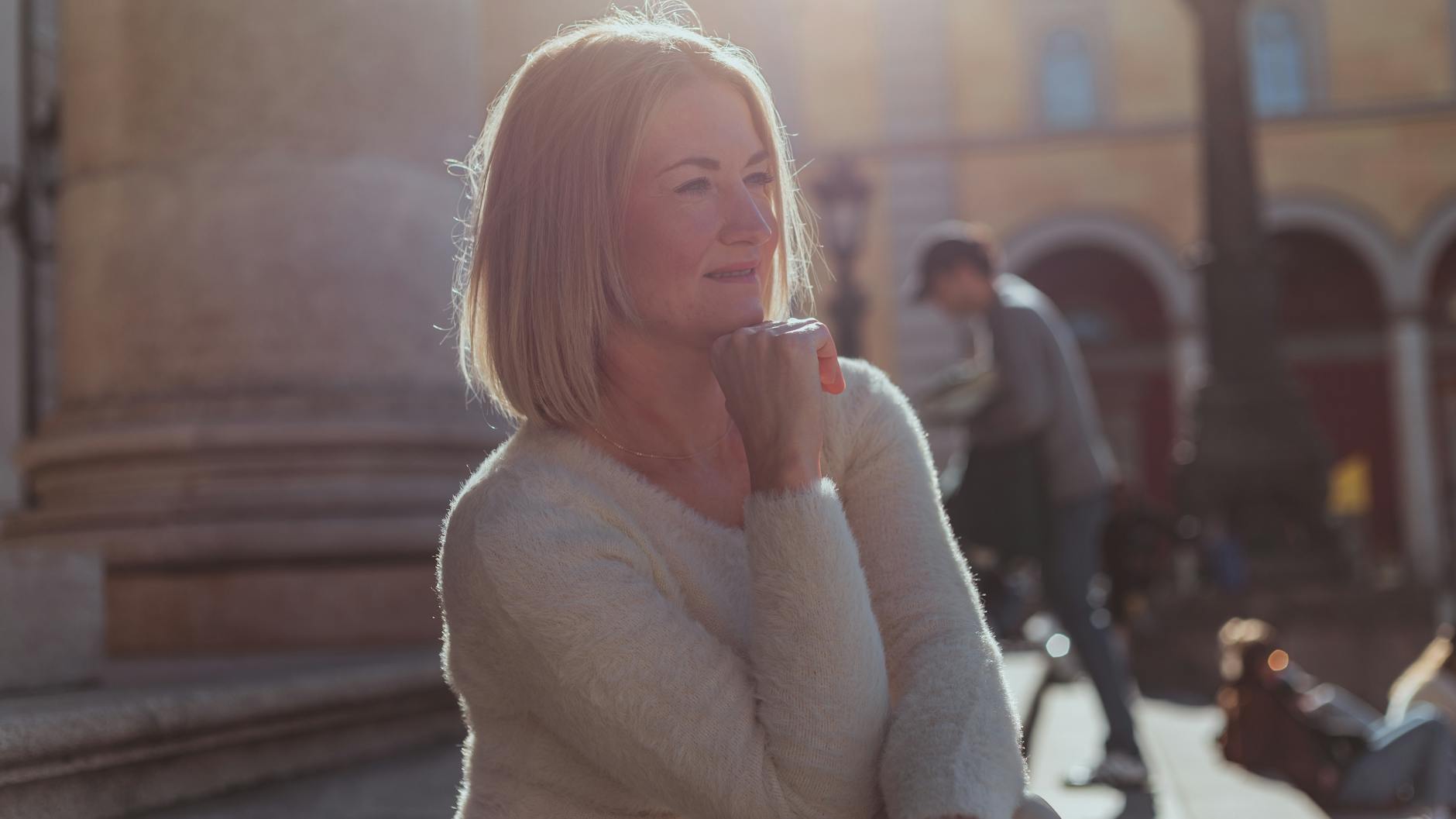 Woman enjoying a sunny day outdoors in Munich