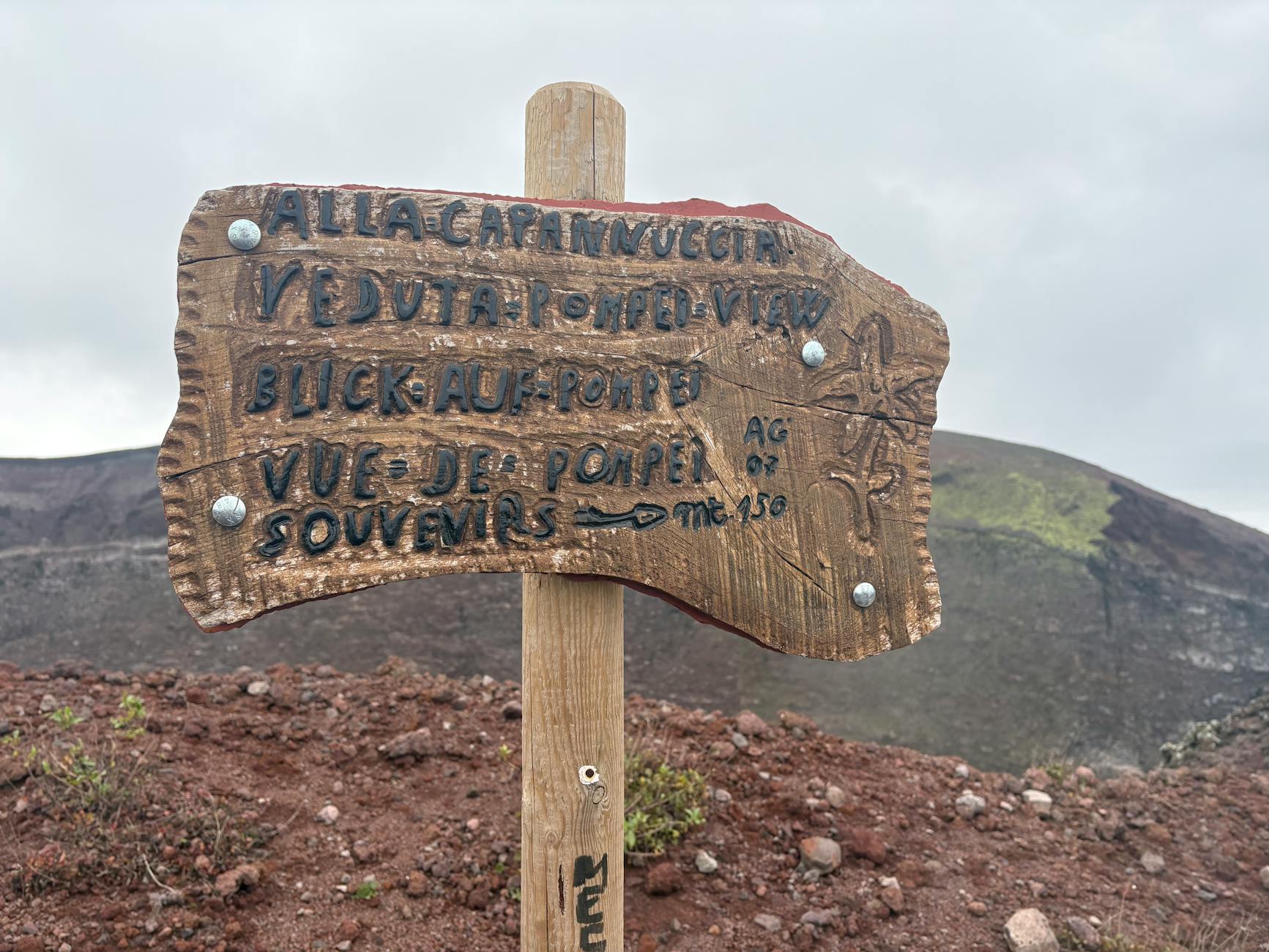 Rustic sign on the Mount Vesuvius trail