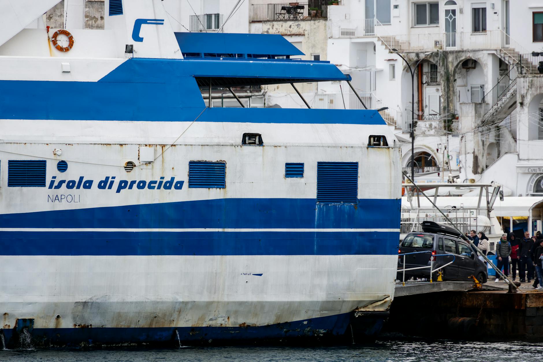 Ferry docked at a port in Naples