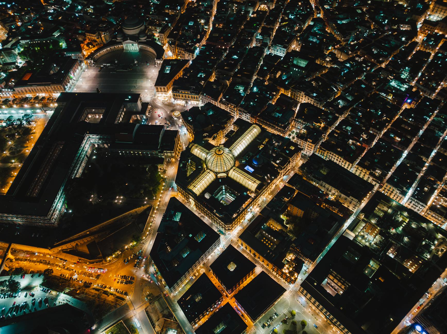 Illuminated Naples streets and architecture from above