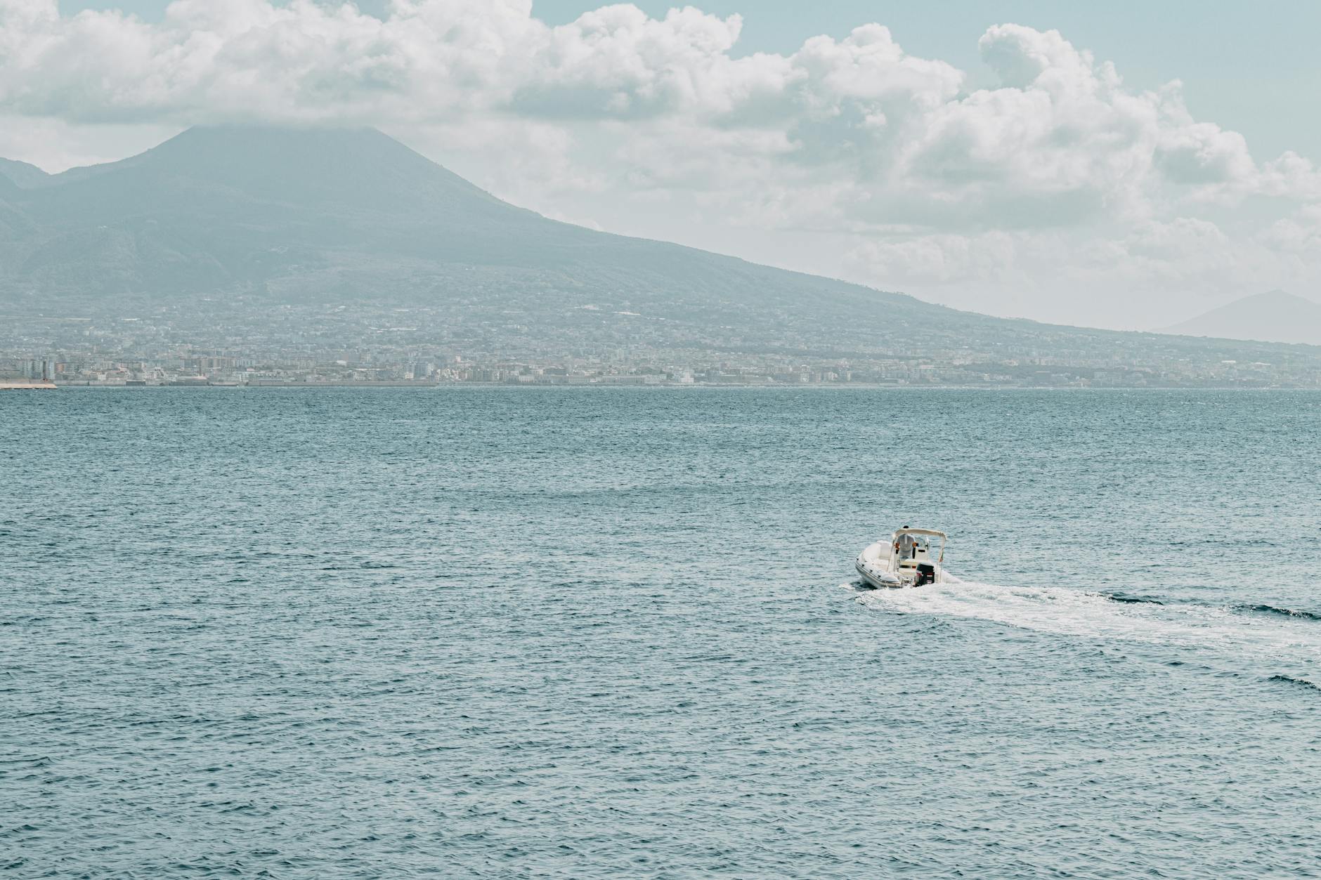 Motorboat on the Bay of Naples with Mount Vesuvius in the background